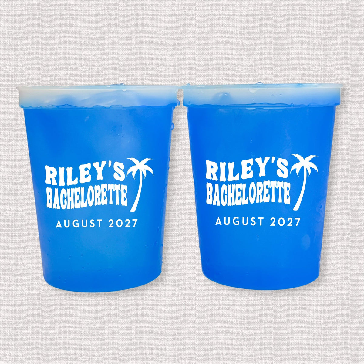 Blue color changing bachelorette stadium cups with palm tree and Riley's Bachelorette August 2027