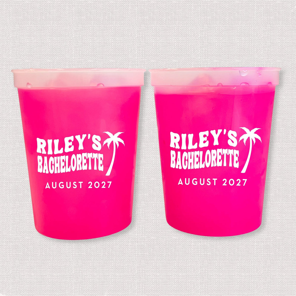 Magenta color changing bachelorette stadium cups with palm tree and Riley's Bachelorette August 2027