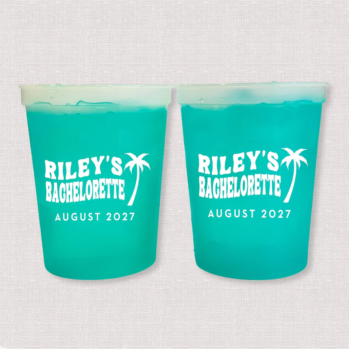 Teal color changing bachelorette stadium cups with palm tree and Riley's Bachelorette August 2027