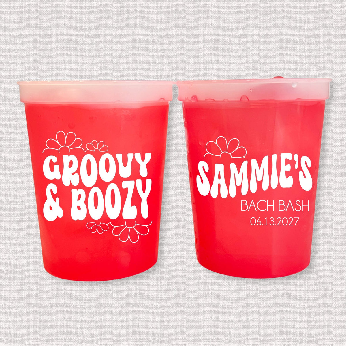 Red color changing bachelorette stadium cups with Groovy & Boozy retro design and Sammie's Bach Bash