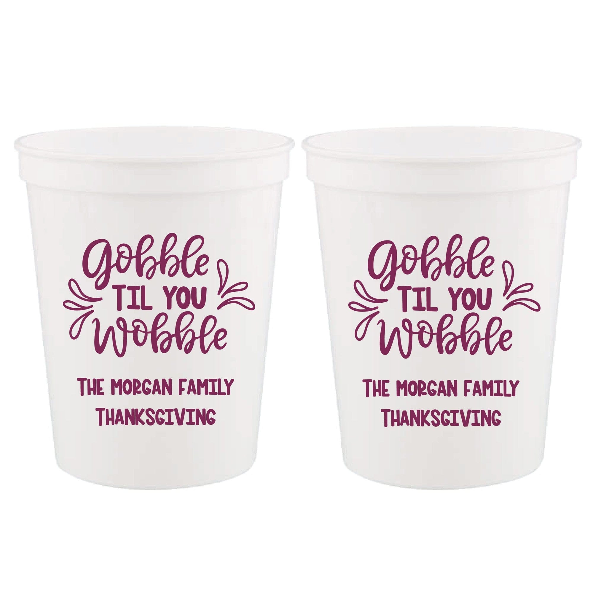 Two white plastic cups are custom printed with festive purple text, ideal for a Thanksgiving celebration.