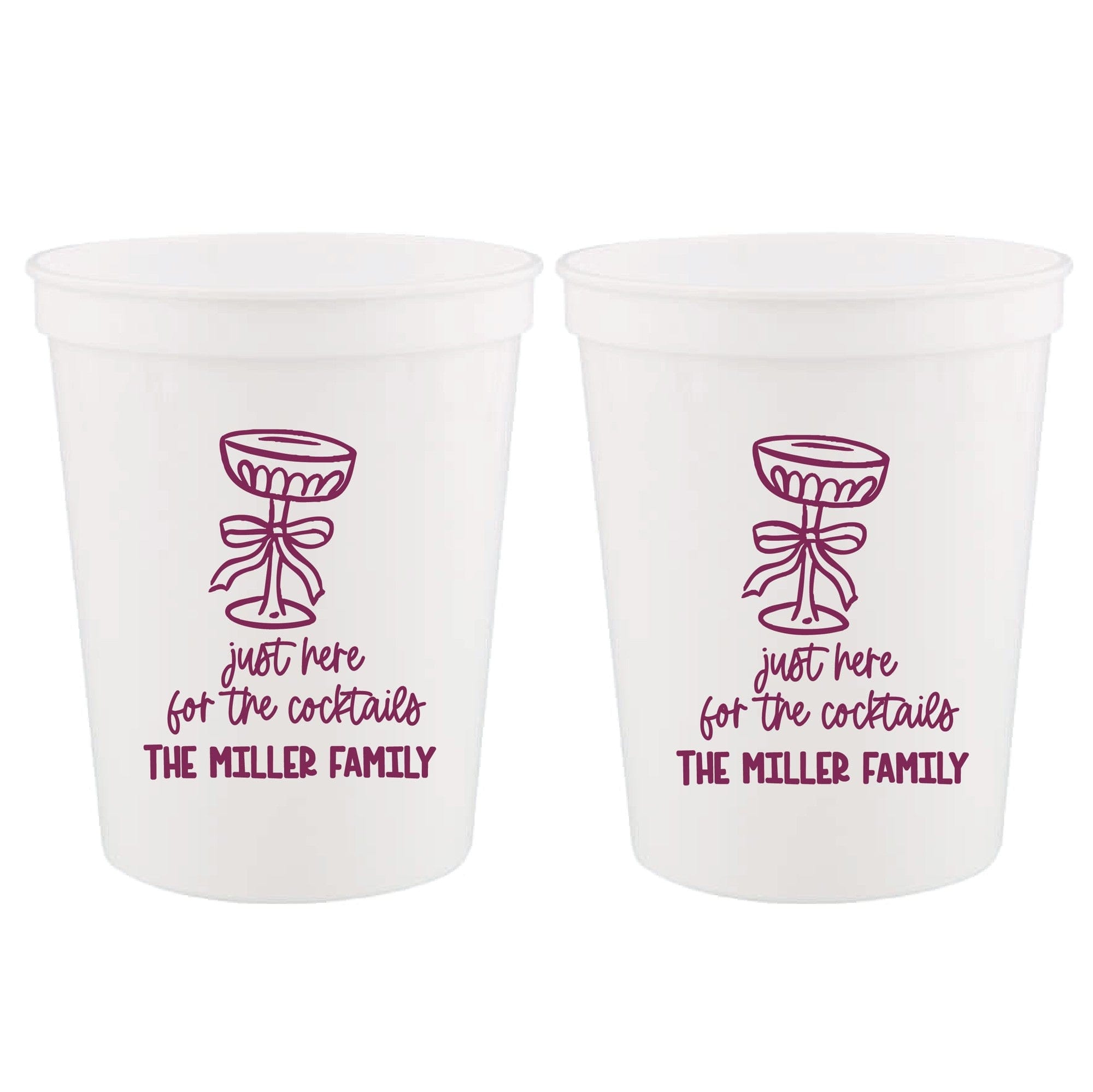 Two white frosted reusable party cups featuring a purple illustration of a cocktail glass with a bow, perfect for a wedding or event bar.