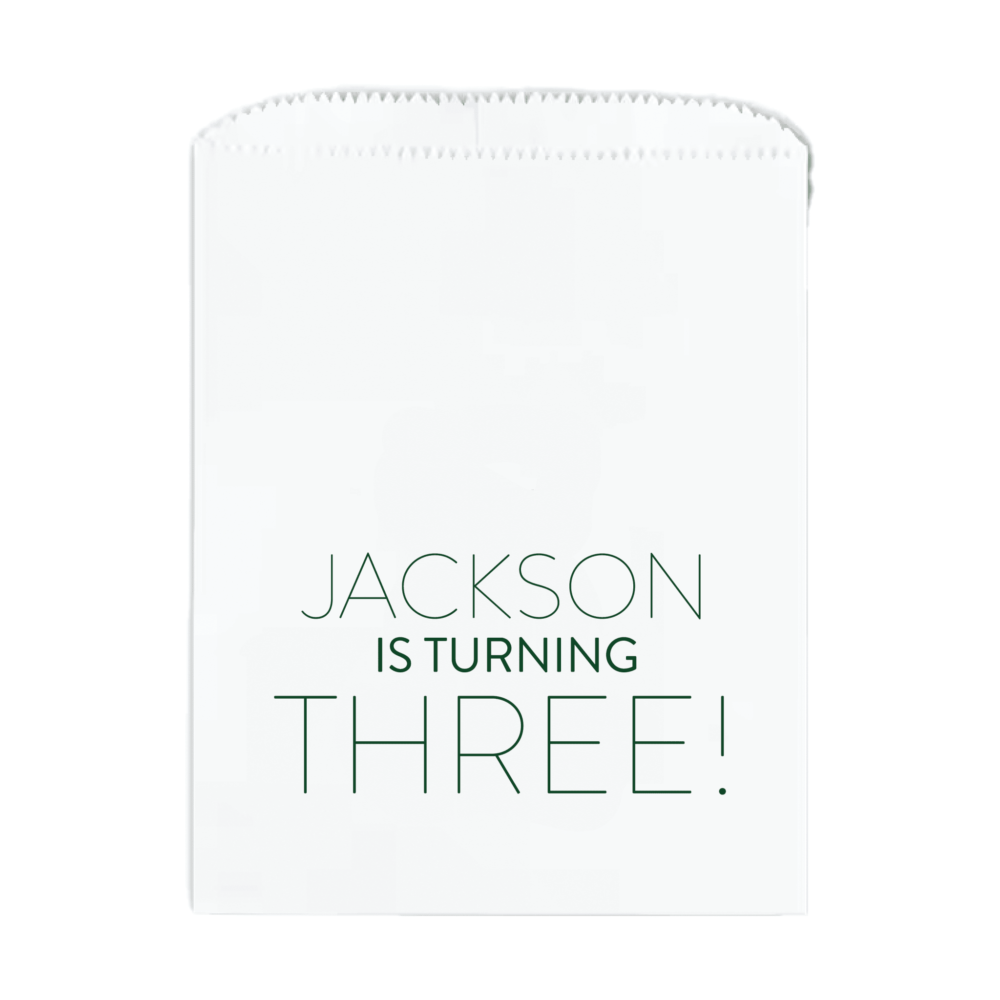 White treat bag with "Jackson is turning three!" in teal lettering for a birthday party favor
