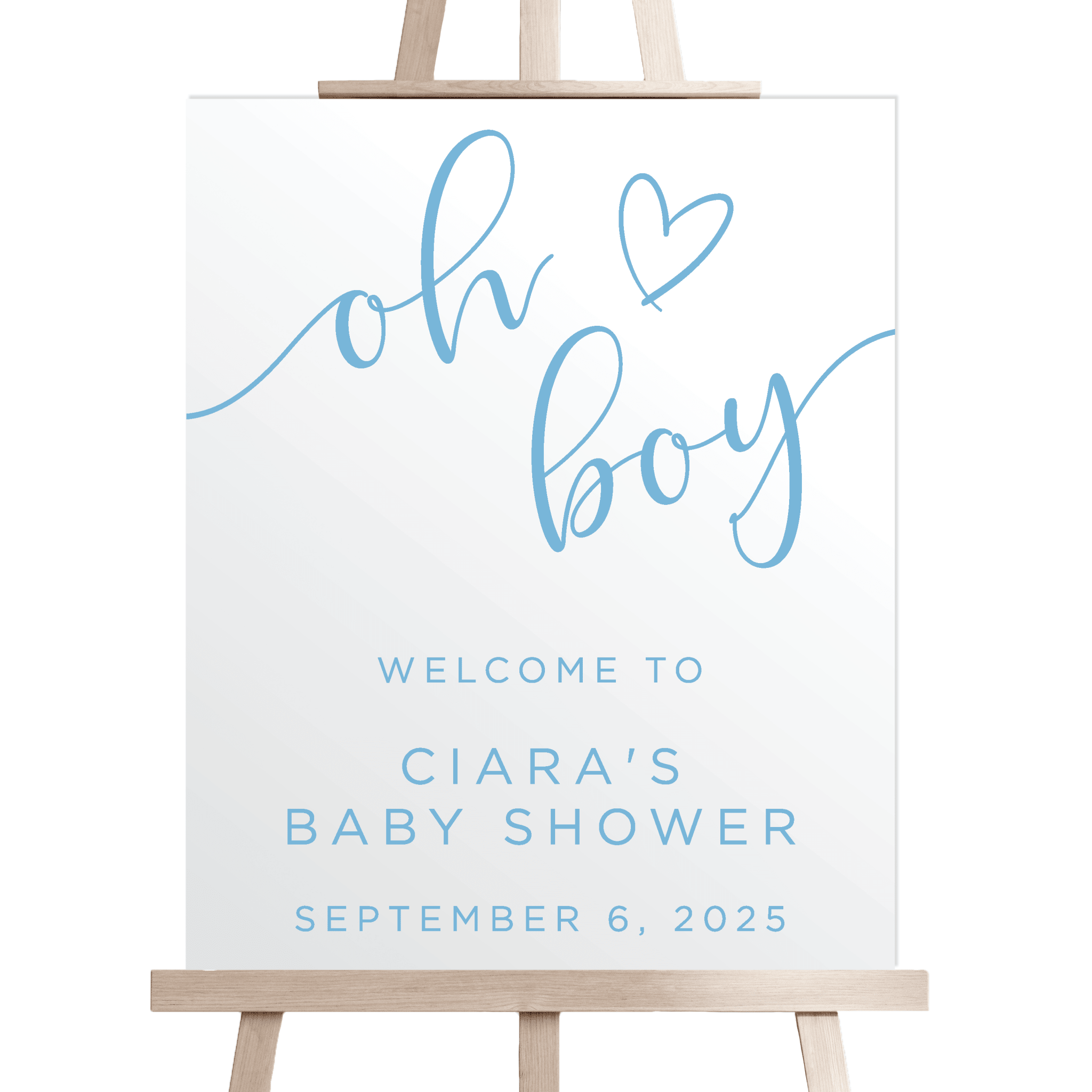 White acrylic welcome sign with blue script text reading "oh boy" and heart, personalized with "Ciara's Baby Shower" and date September 6, 2025, displayed on wooden easel.
