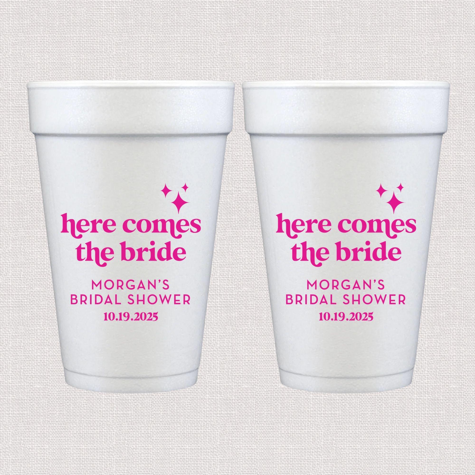 White foam cup with hot pink here comes the bride text and personalized bridal shower details
