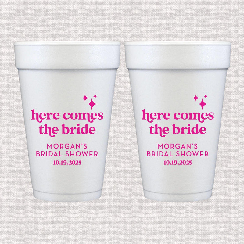 White foam cup with hot pink here comes the bride text and personalized bridal shower details