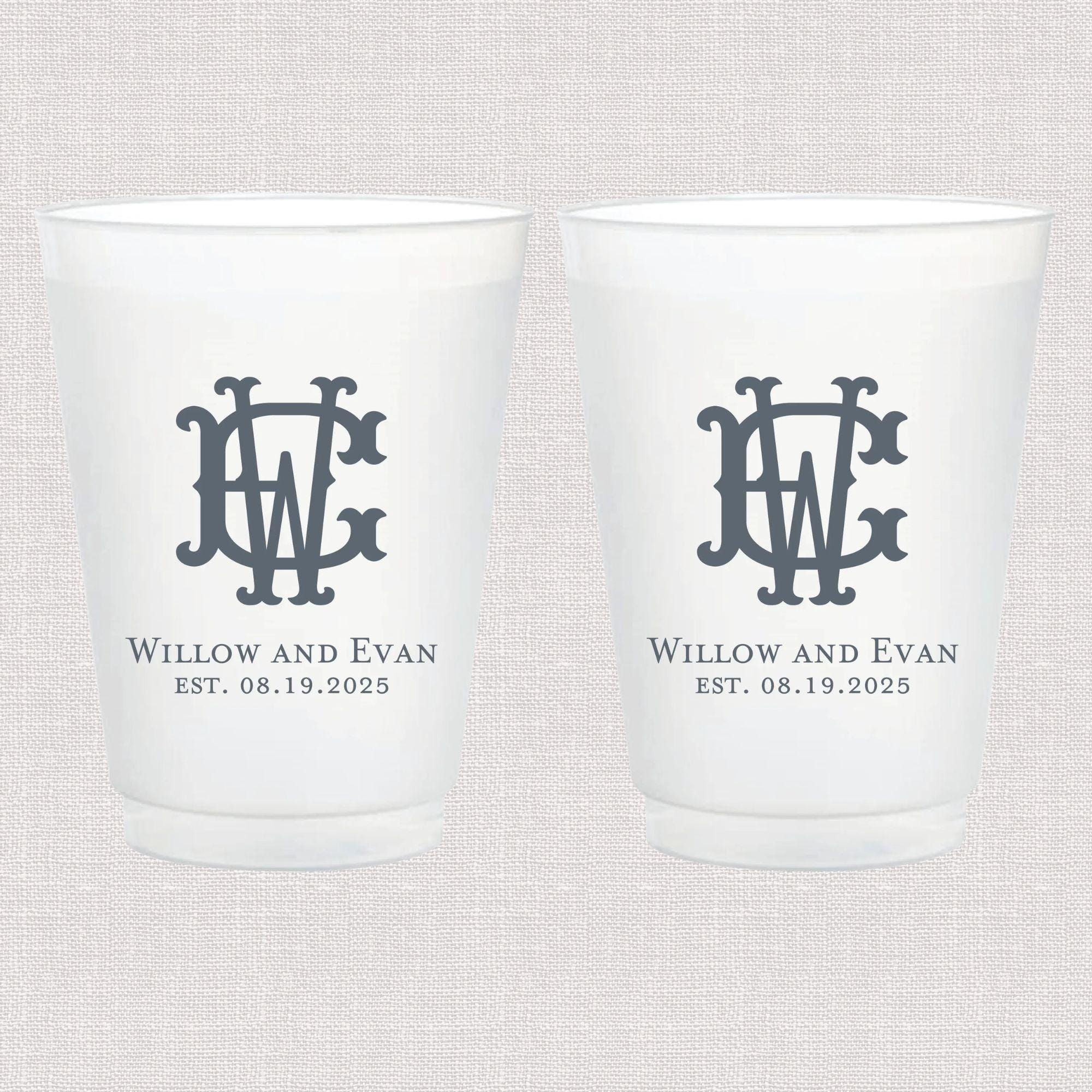 Two frosted wedding cups with interlocking monogram and couple names Willow and Evan with establishment date 08.19.2025.