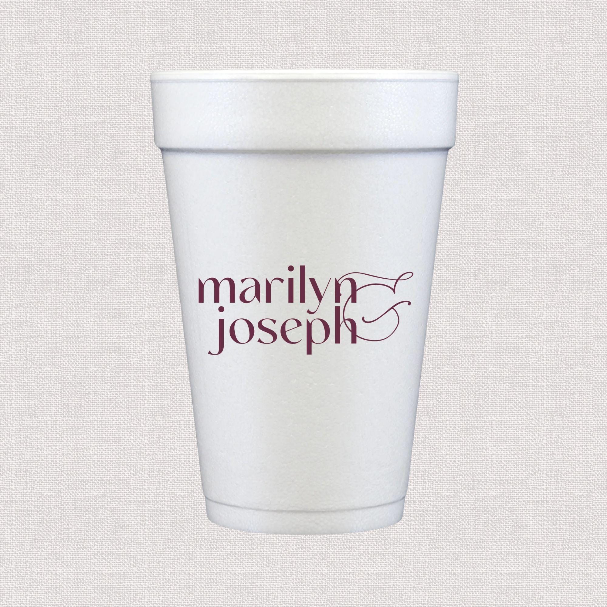 White foam cup with burgundy text reading "marilyn joseph" and decorative leaf design