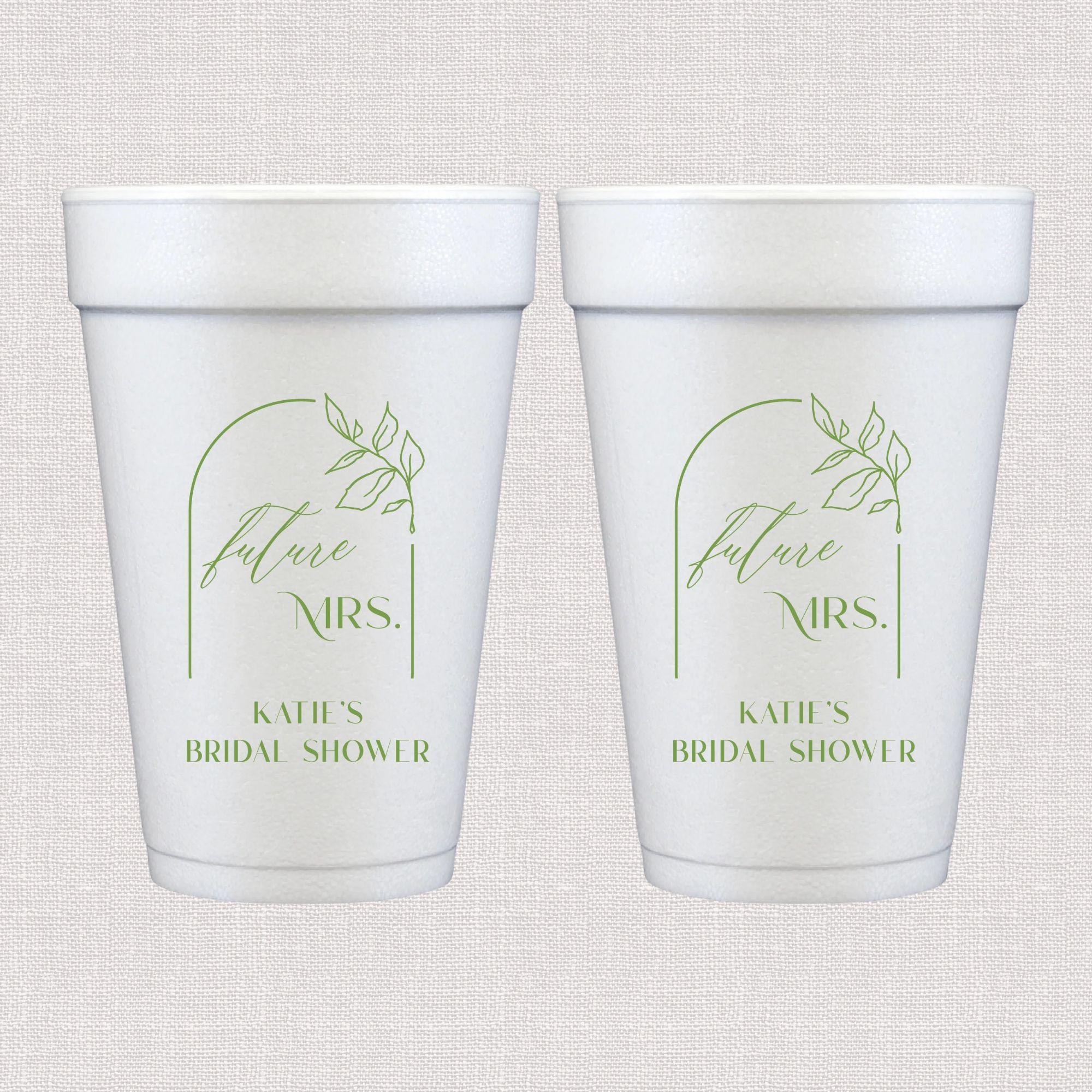 White foam cup with sage green floral arch and personalized wedding text design
