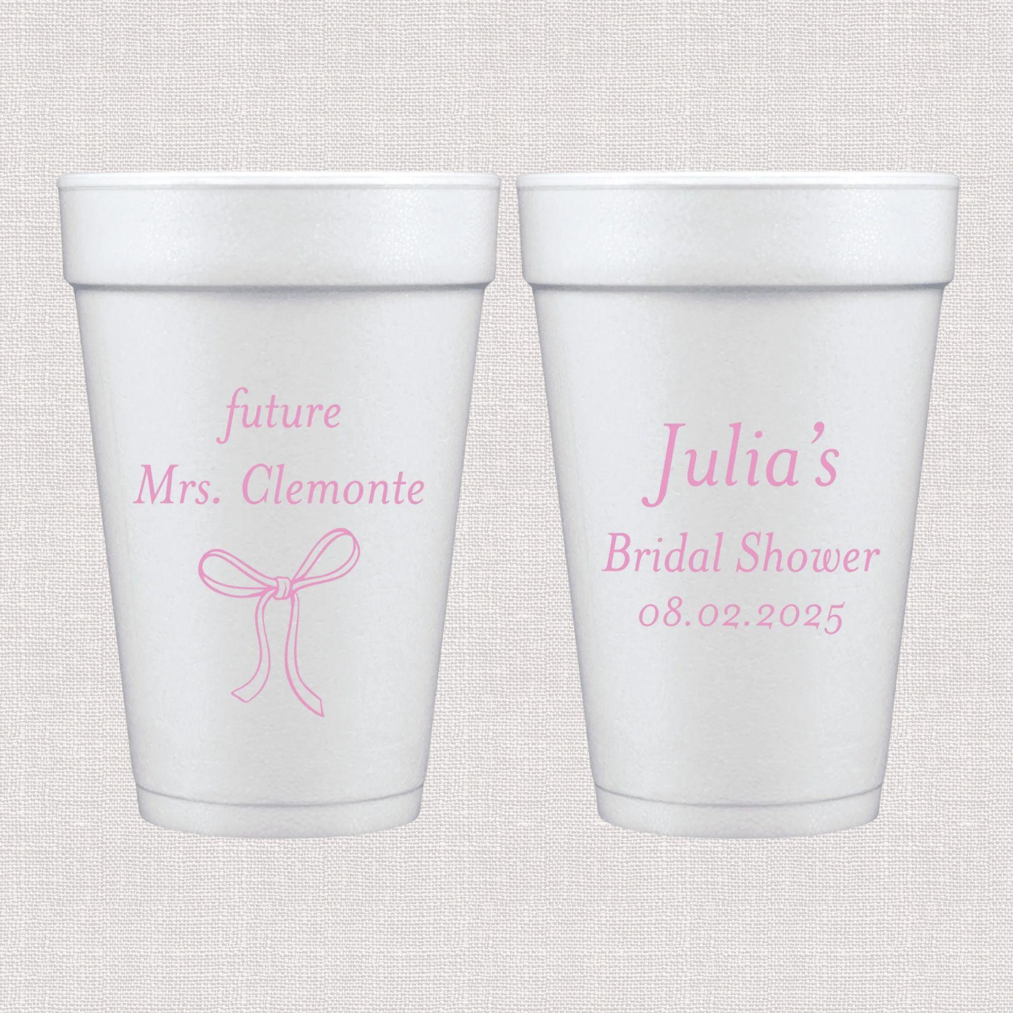 White foam cups with pink bow design and personalized bridal shower text