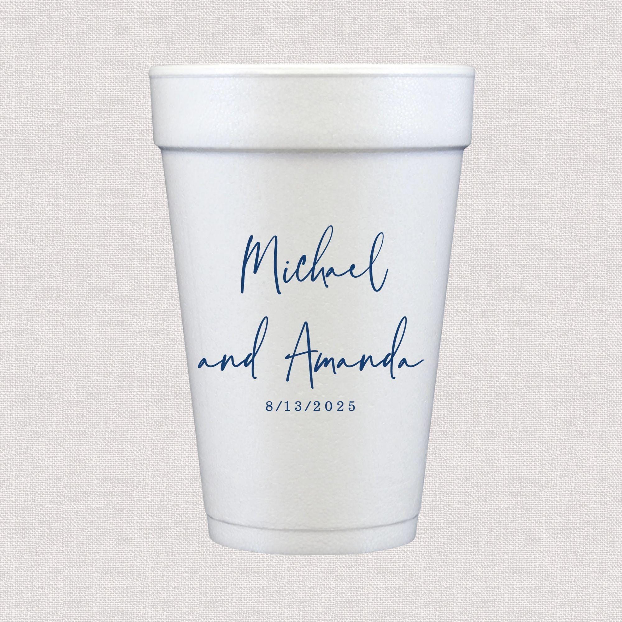 White foam cup with blue script text reading "Michael and Amanda" and wedding date "8/13/2025"