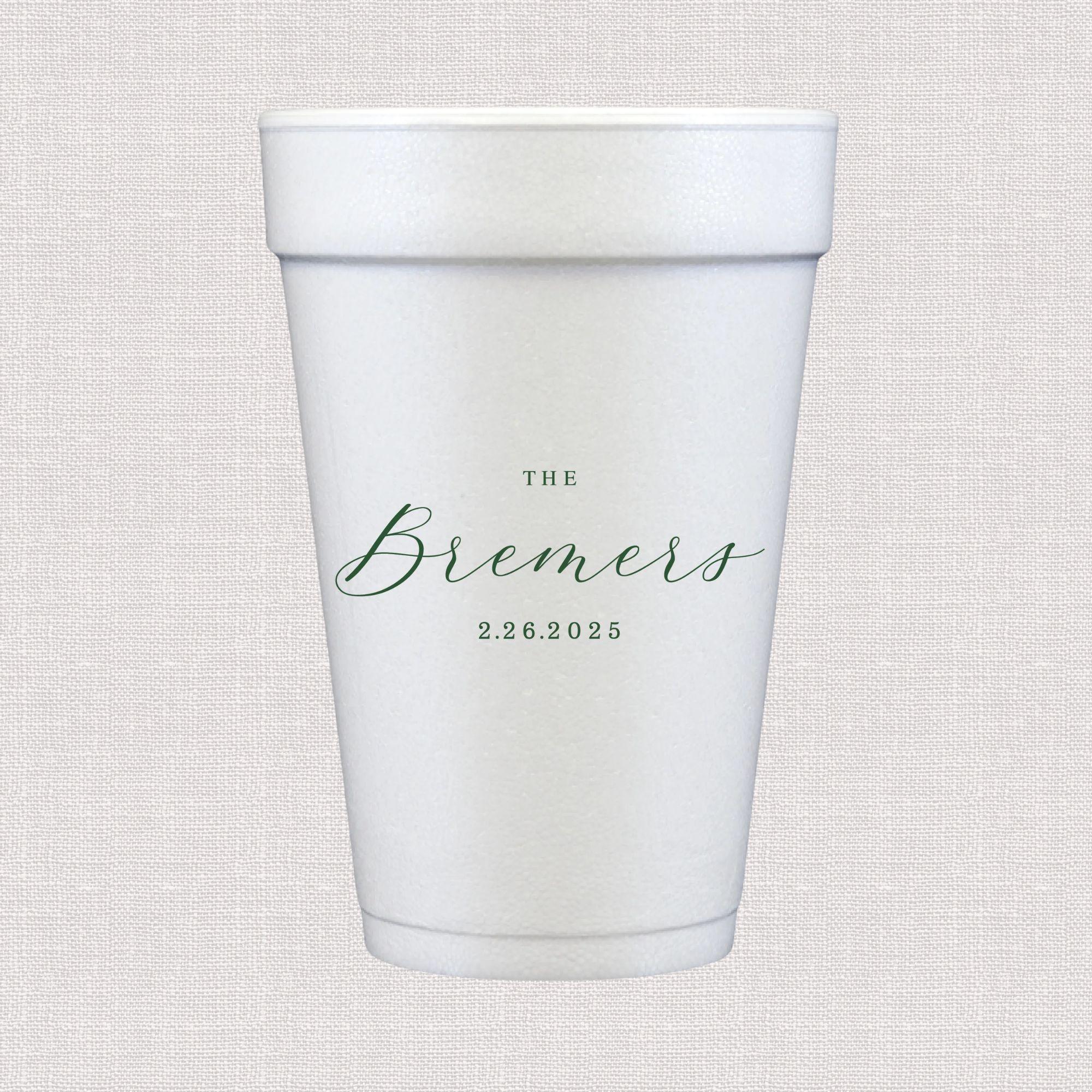 White foam cup with personalized last name and wedding date in script text