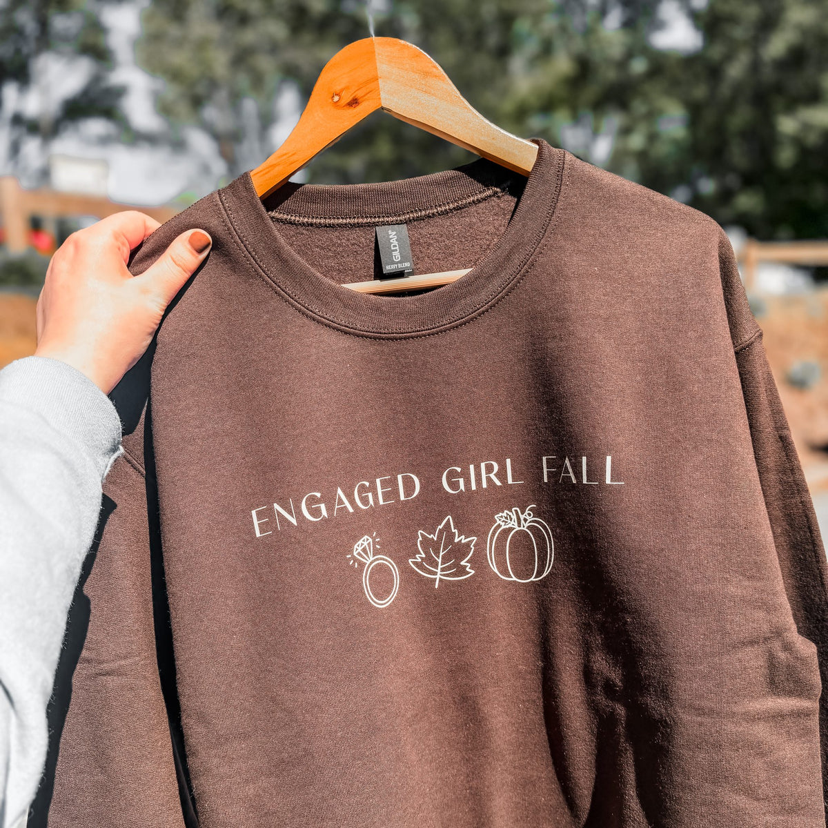 Engaged Girl Fall sweatshirt in brown with ivory ring, maple leaf and pumpkin design, fall engagement gift
