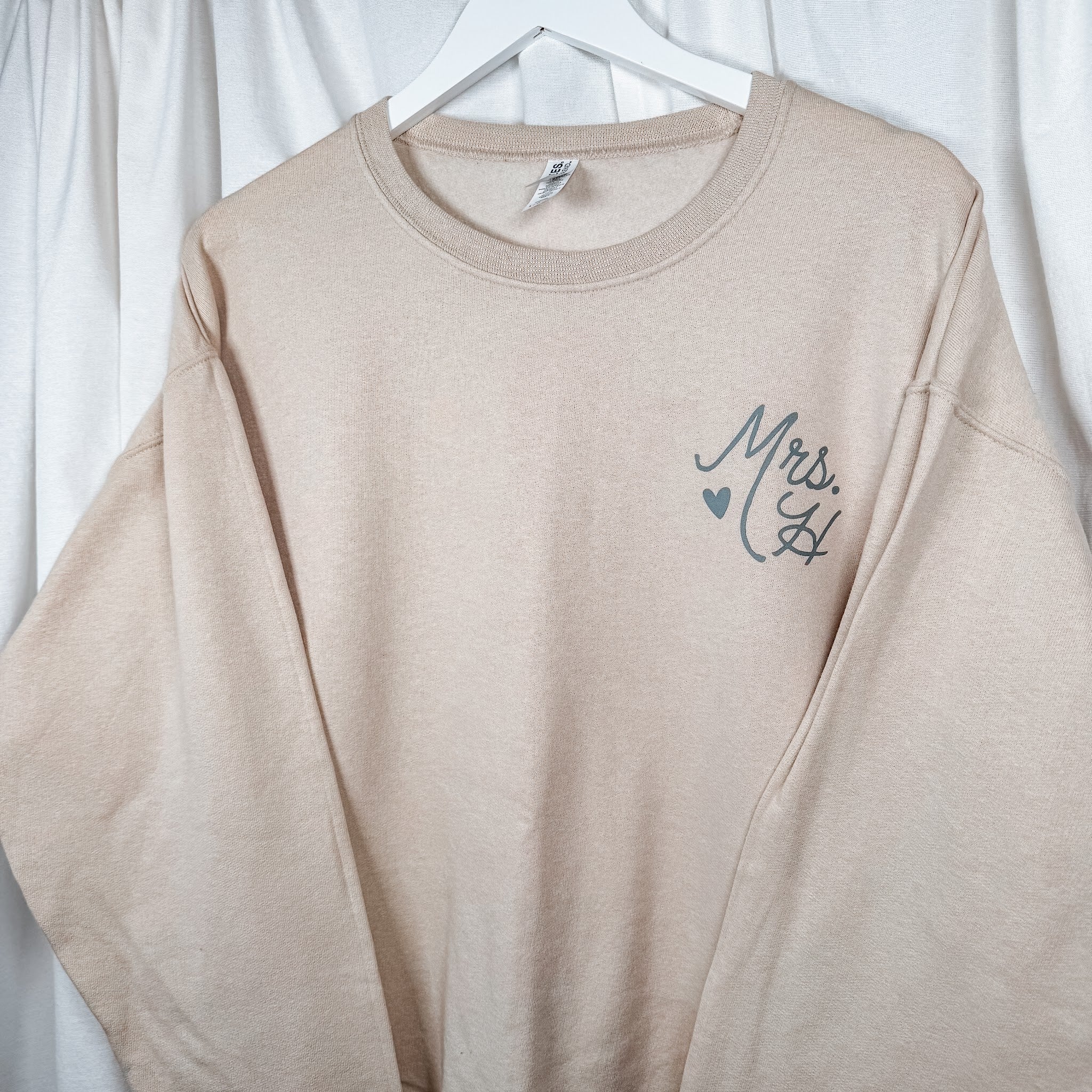 Bride Mrs. crewneck sweatshirt, close-up of Mrs. and initial design