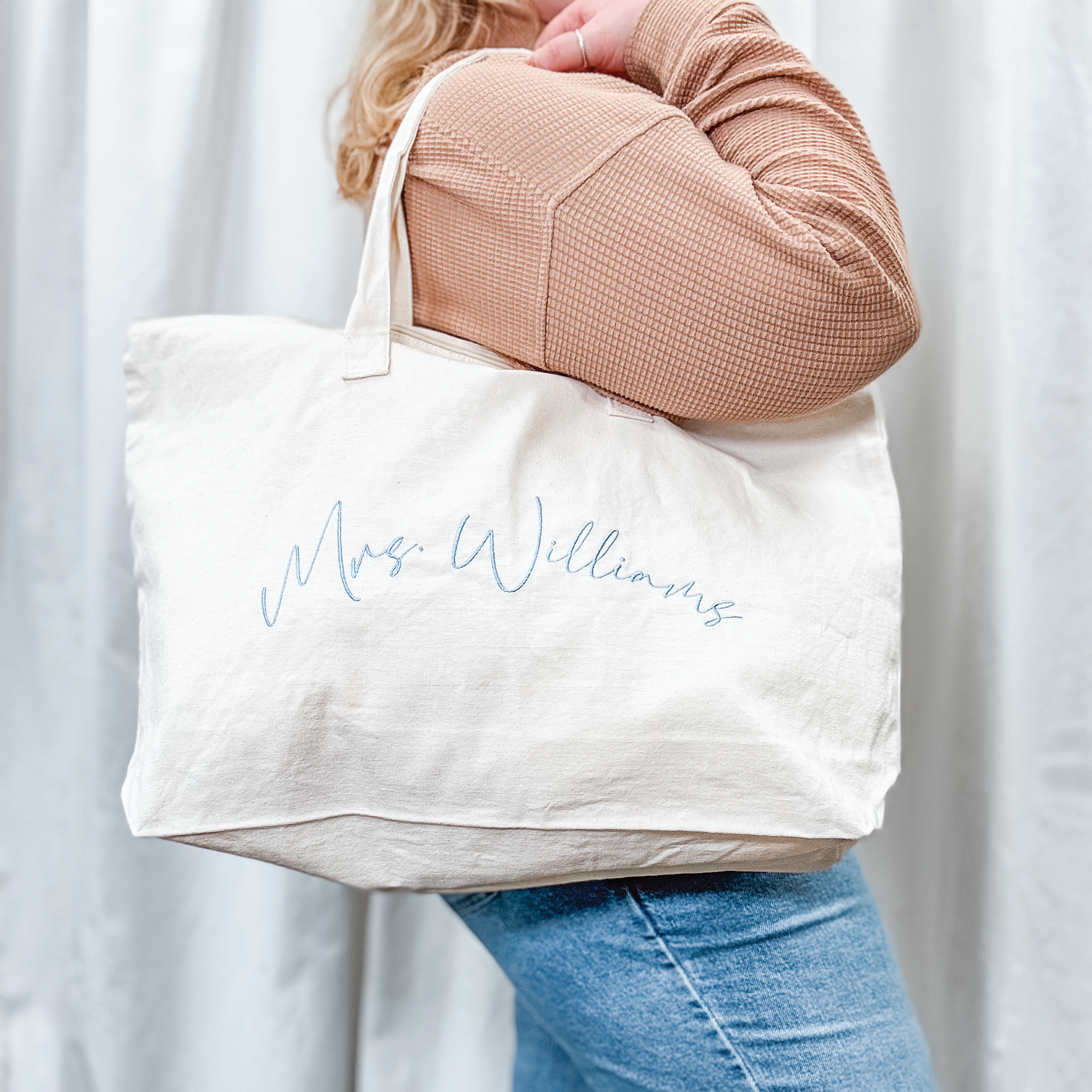 Monogrammed zippered canvas tote for a newlywed