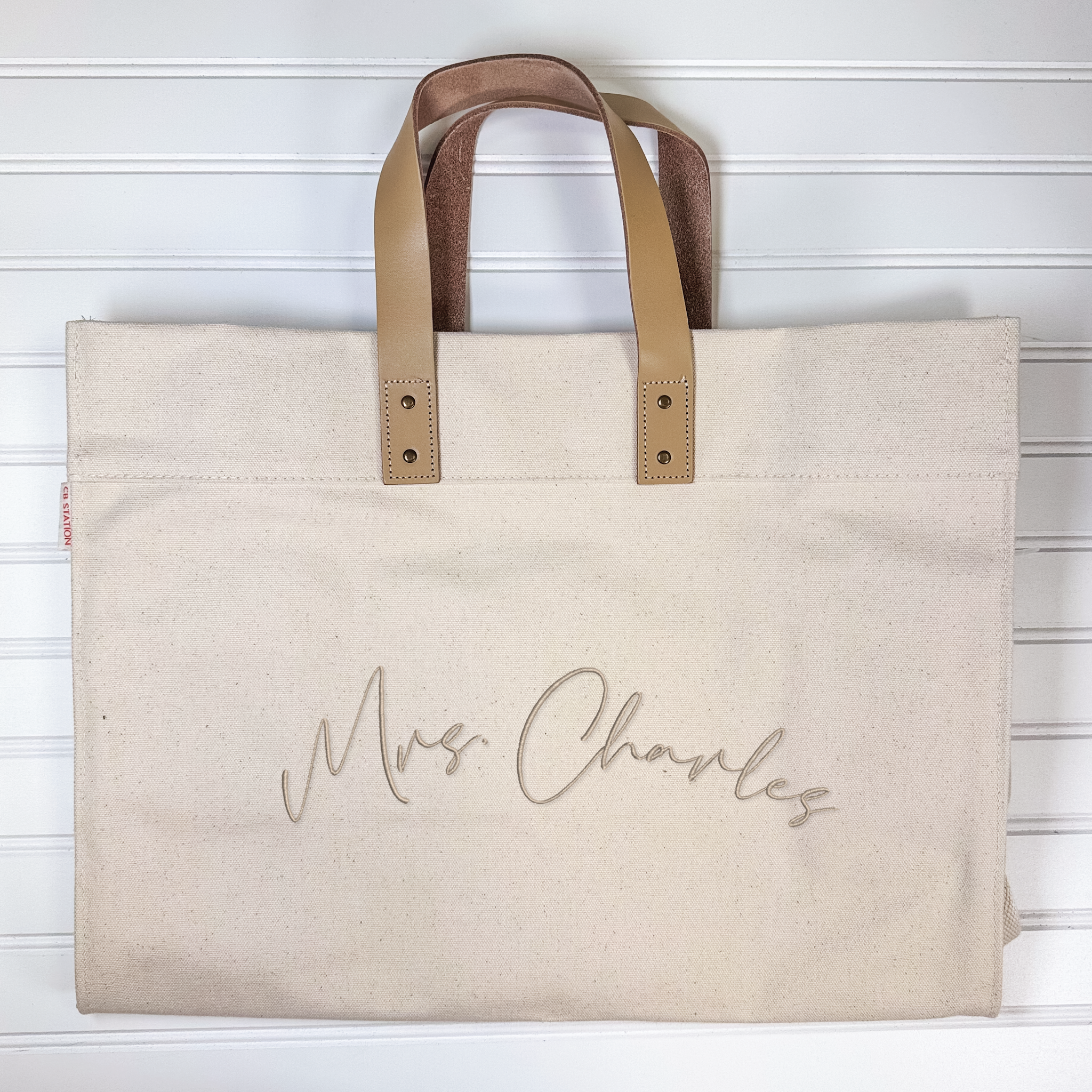 Canvas and leather shoulder tote with personalized name