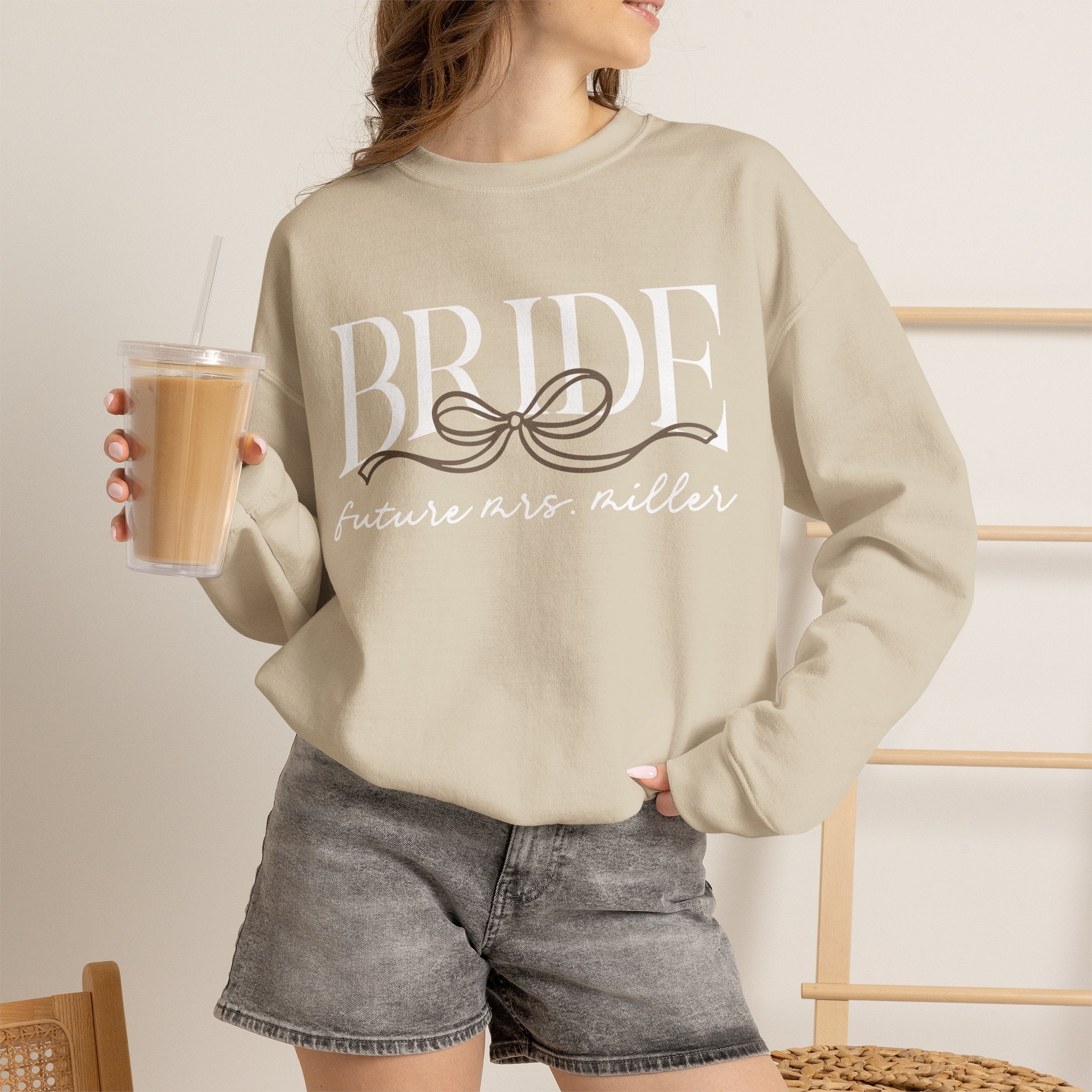 Flat lay of Bow Bride sweatshirt showing full design, fabric quality, and print detail