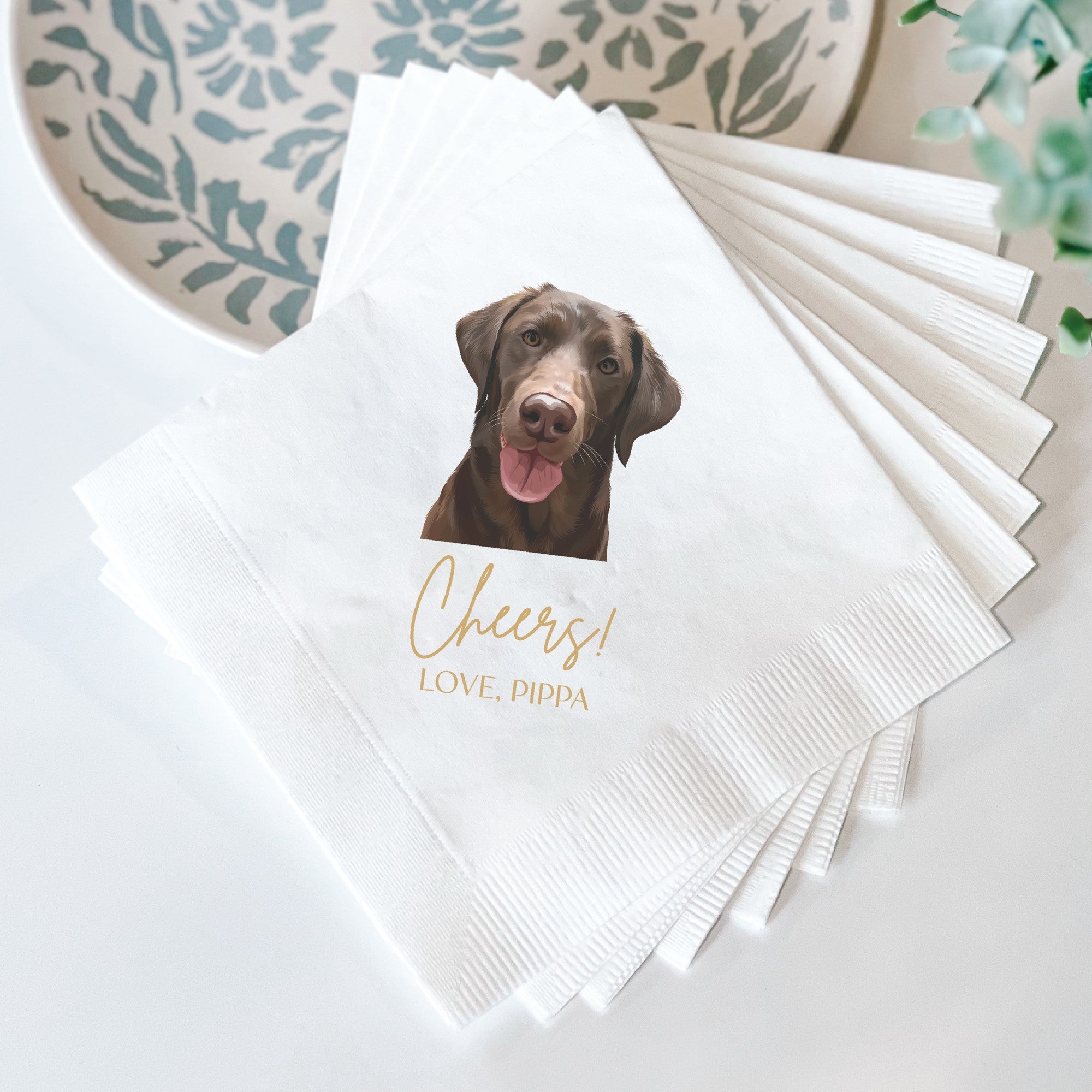 A stack of white 3-ply paper napkins features a full-color pet portrait design, perfect for personalized wedding or event decor.