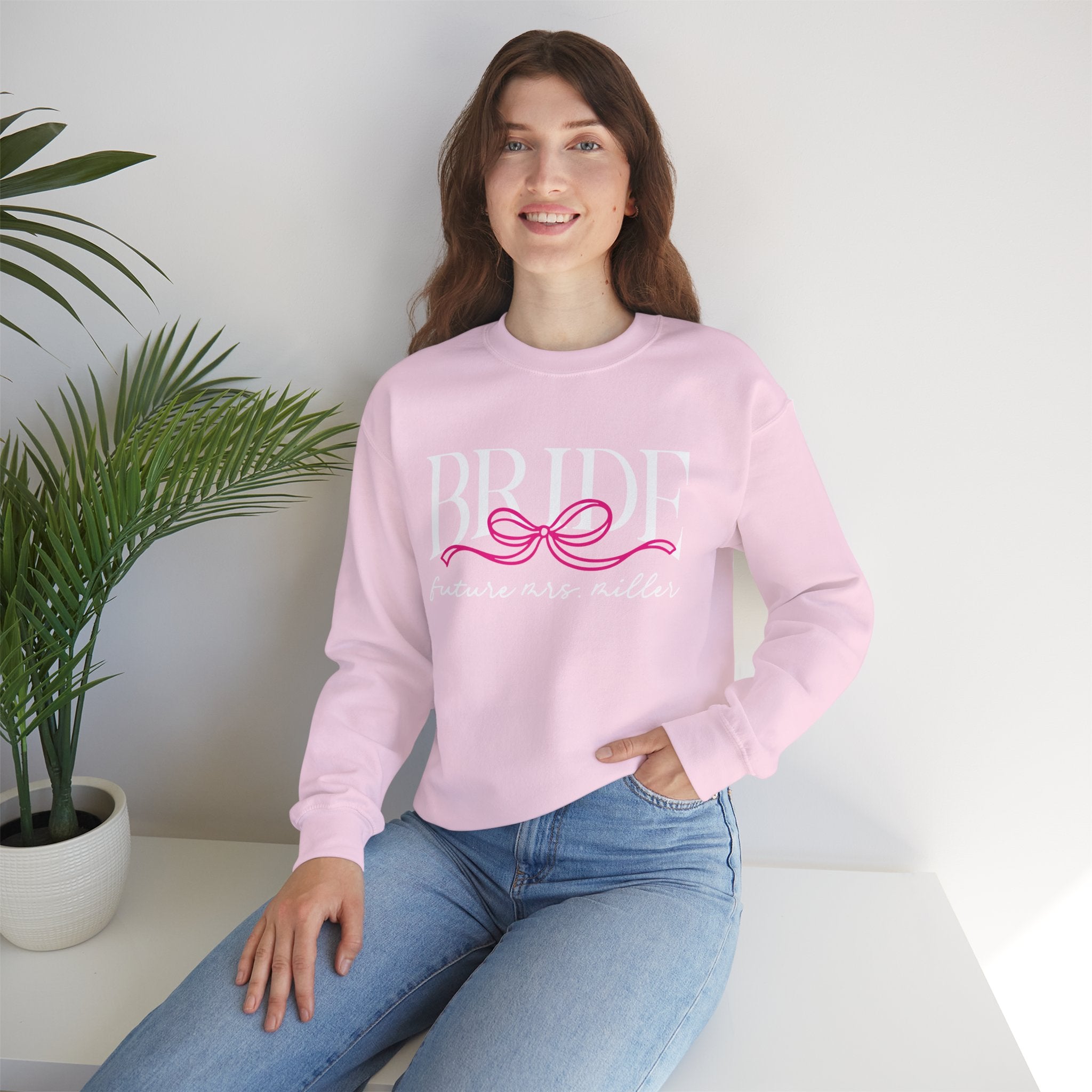 Model wearing Bow Bride bridal crewneck sweatshirt - lifestyle photo showing fit and style