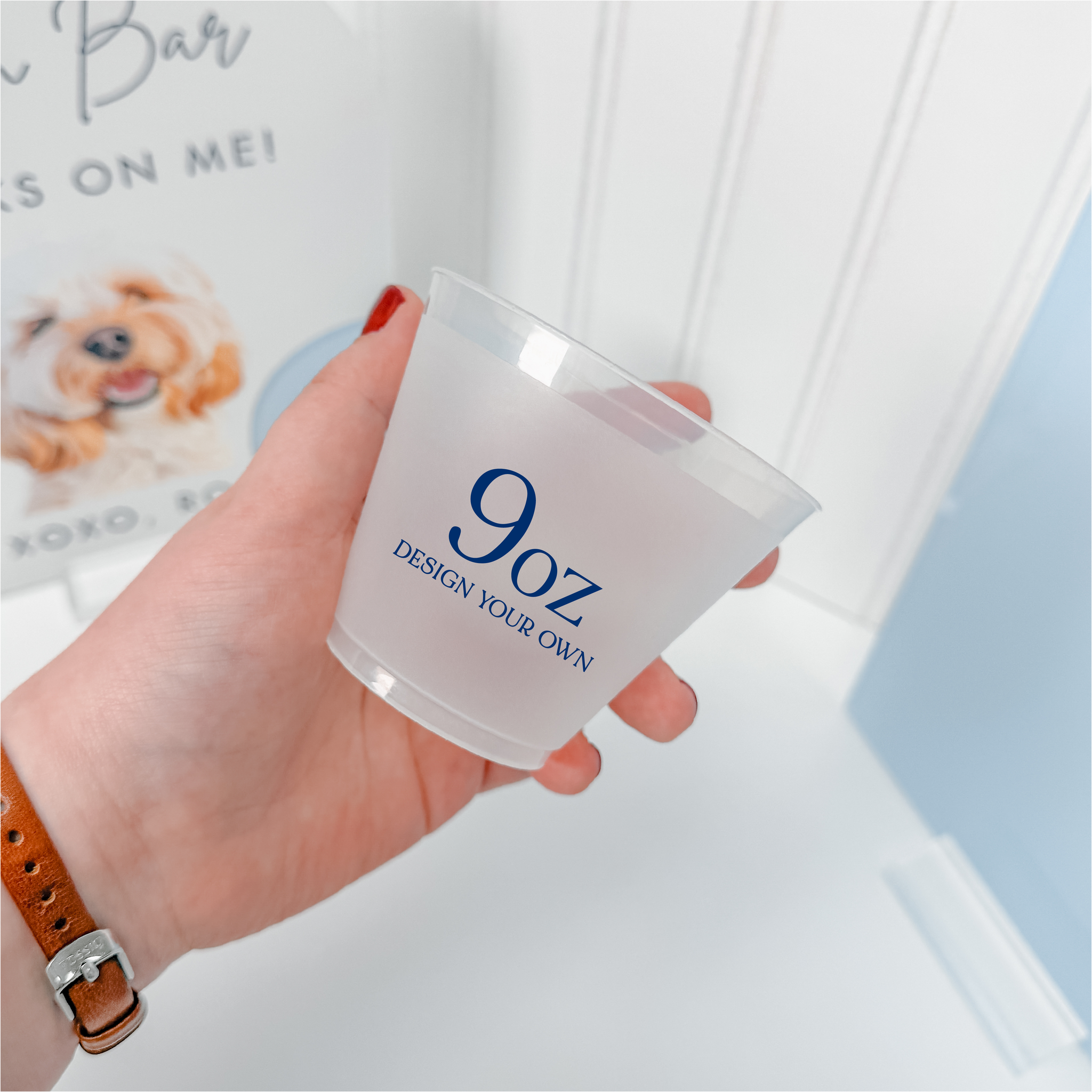 9 oz frosted shatterproof cup held in hand, personalized custom design in navy