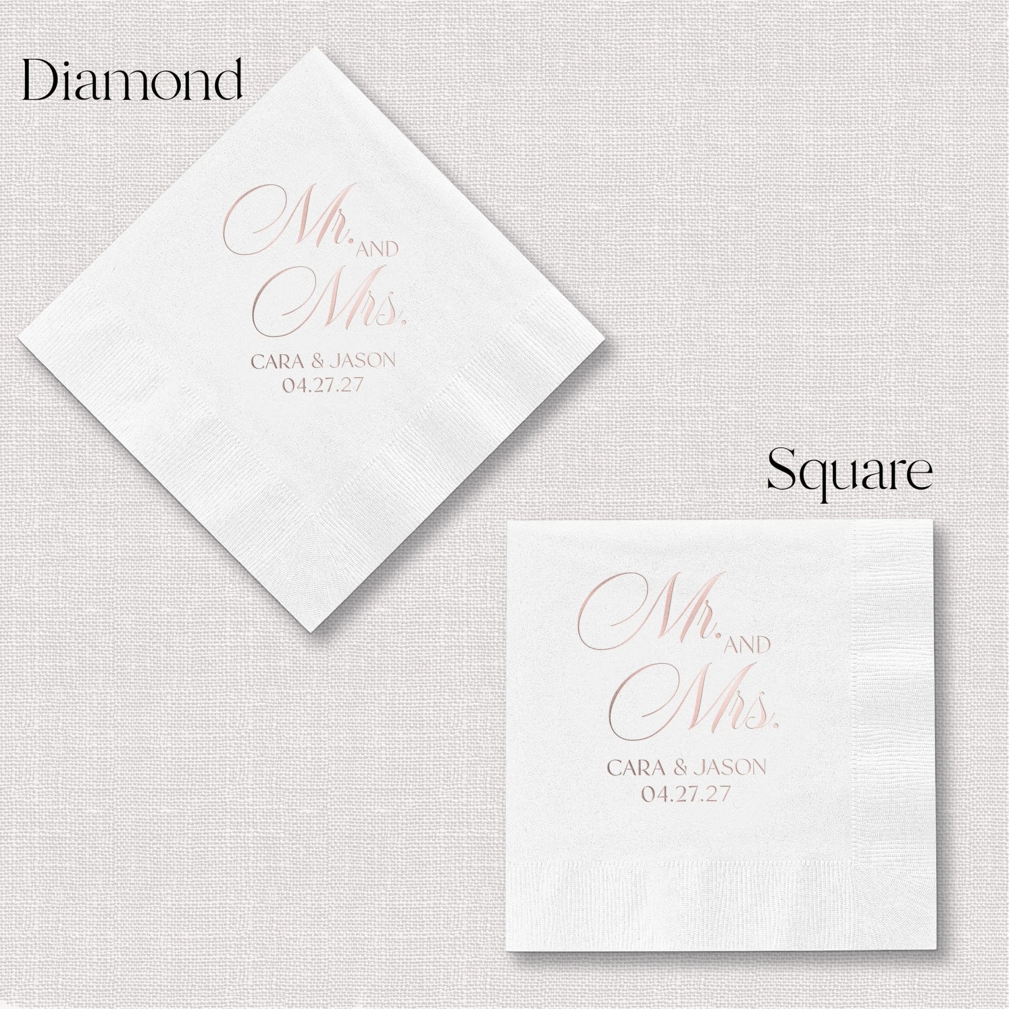 White napkins with diamond and square fold options, personalized with "Mr. and Mrs." in script and couple names with wedding date in rose gold foil.