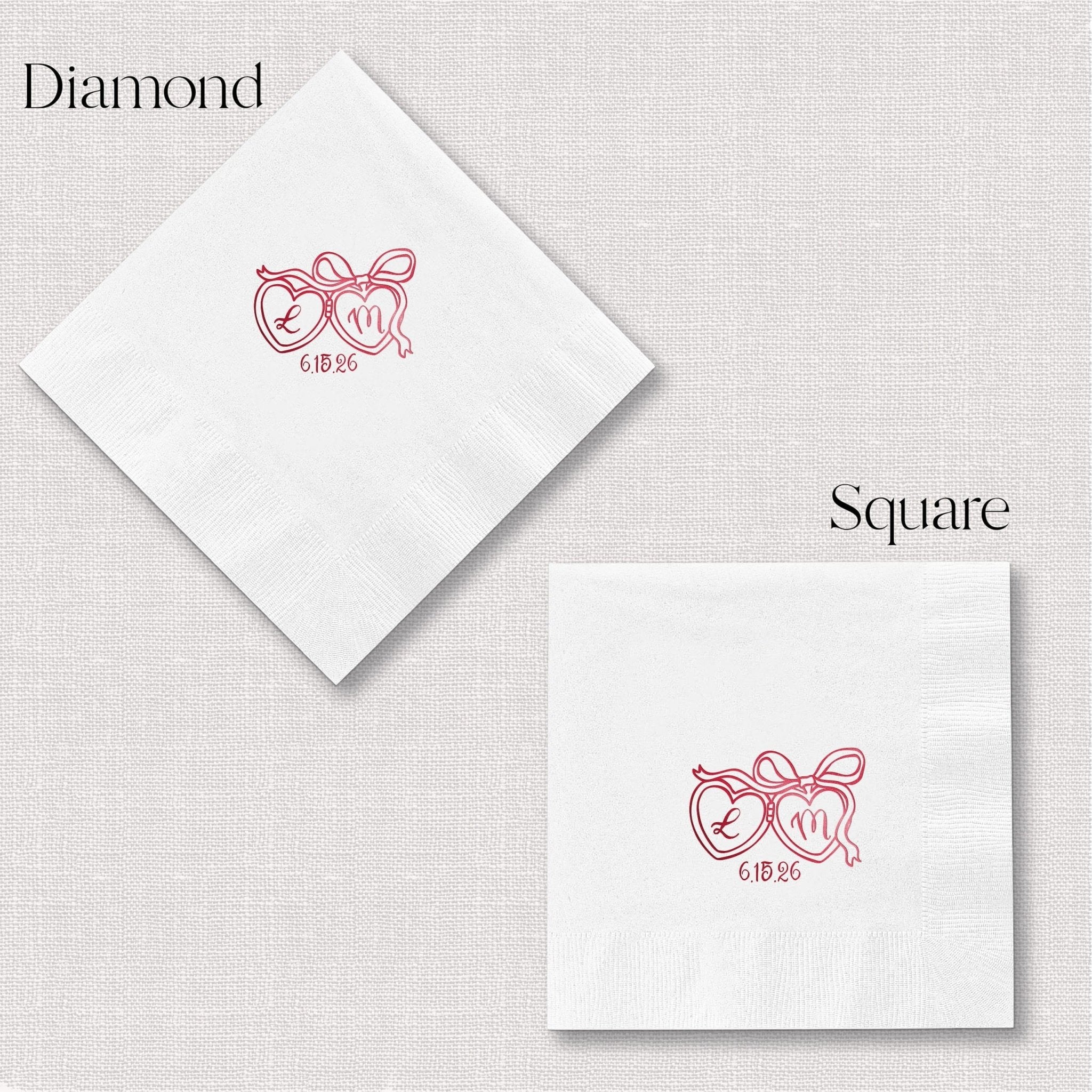 White cocktail napkins in diamond and square shapes with pink foil-stamped heart locket design and initials.