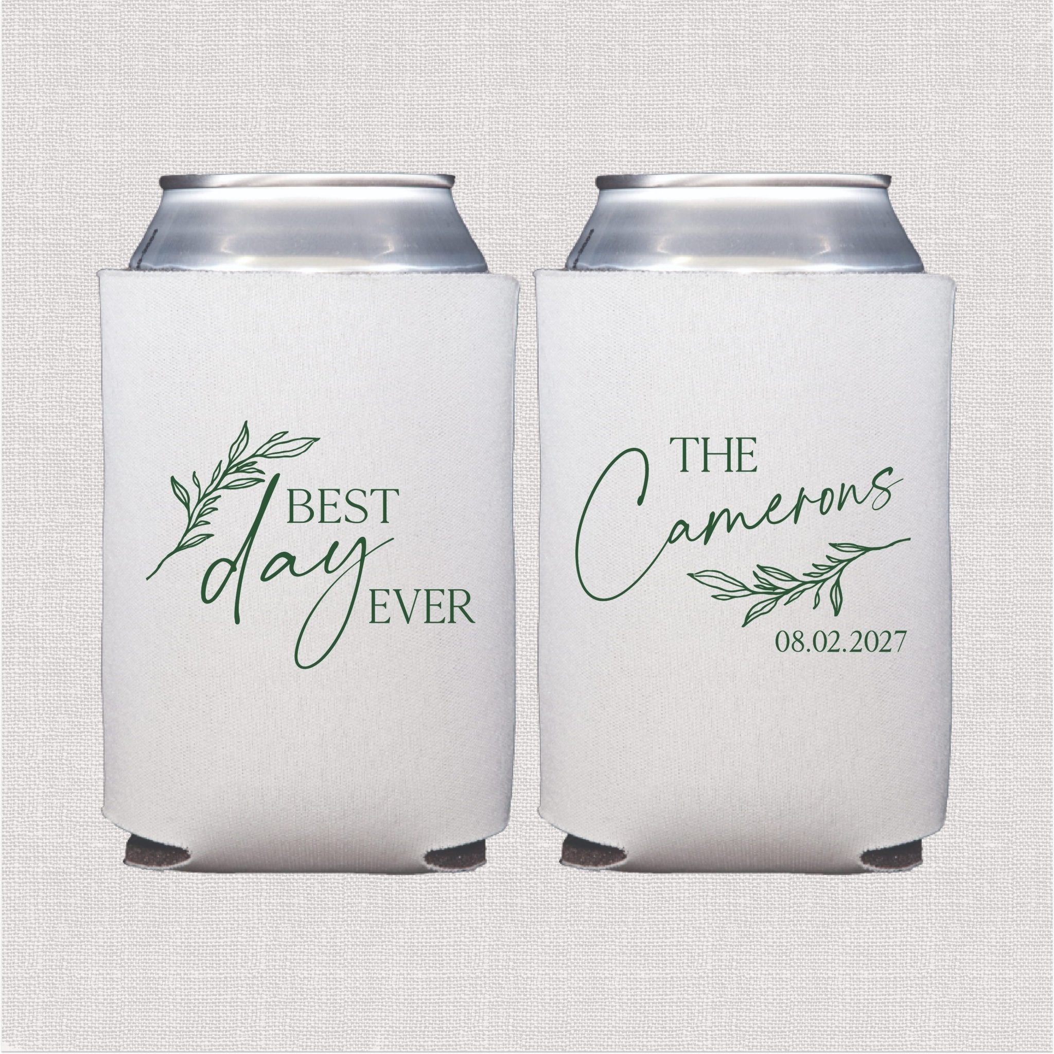 Pair of white neoprene can coolers with sage green leaf designs and personalized text reading "BEST day EVER" and "THE Camerons 08.02.2027"