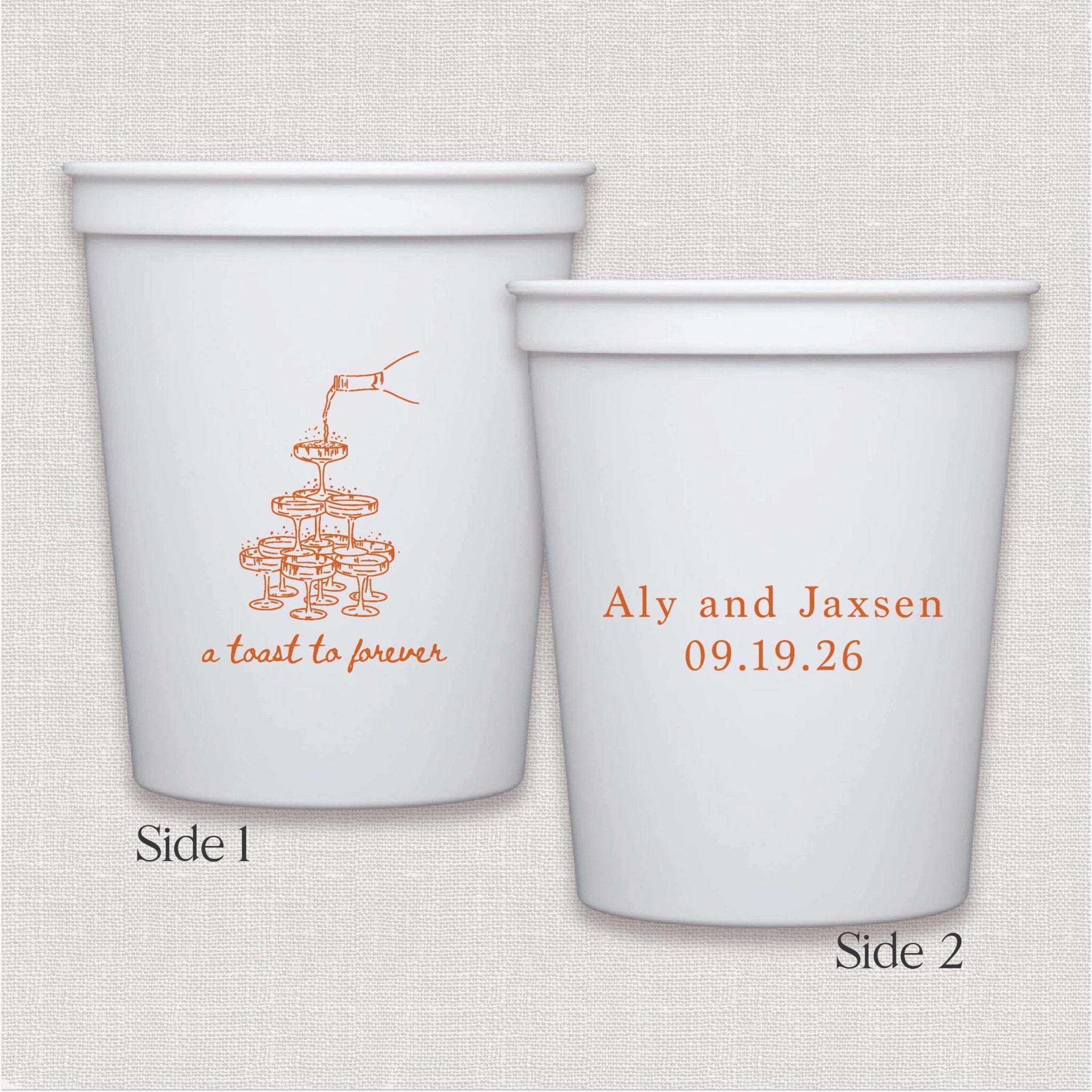 White stadium cup with coral toasting design and personalized wedding text