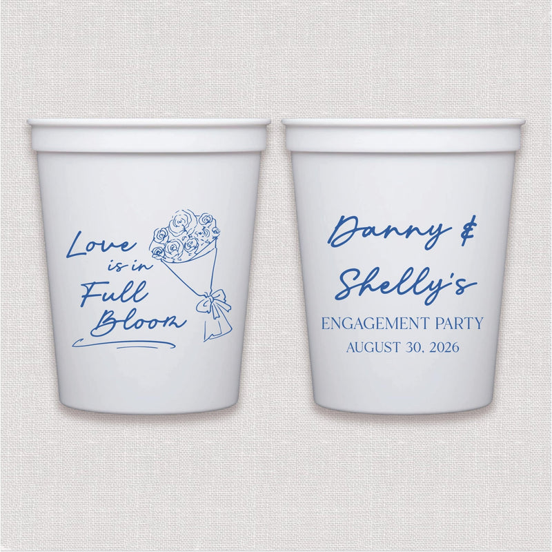 White stadium cup with blue floral and script wedding engagement design