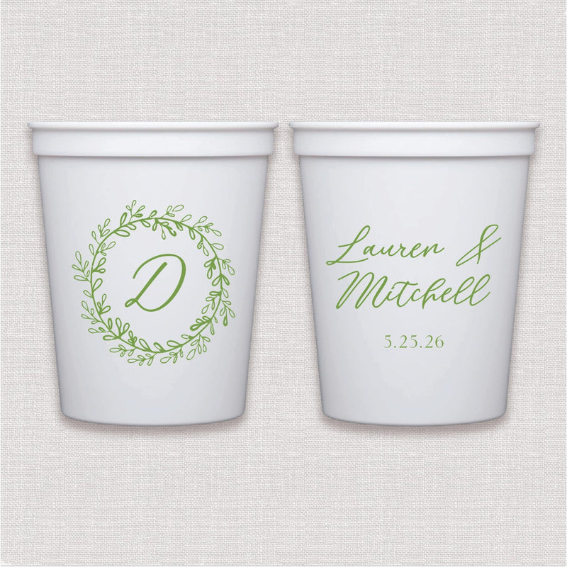 White stadium cup with sage green floral wreath monogram and personalized wedding text design