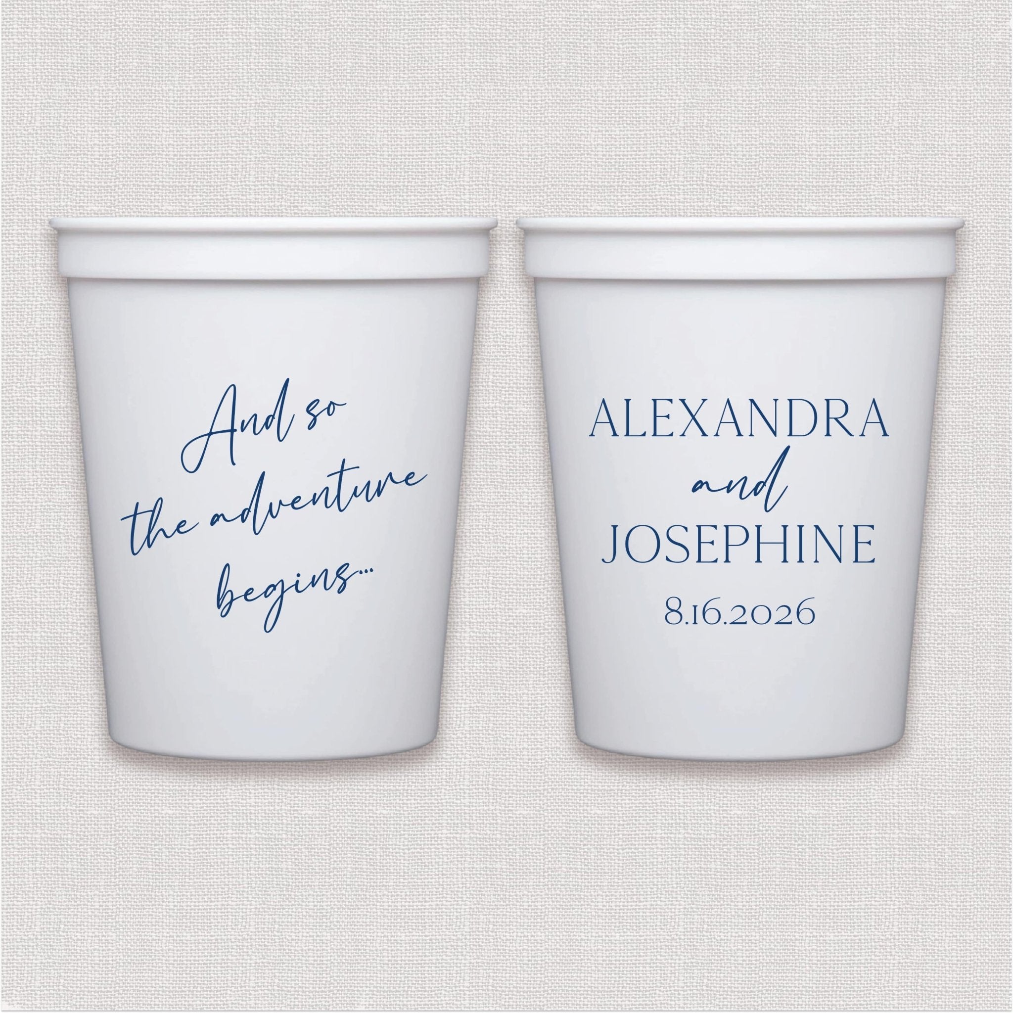 White stadium cups with blue script wedding text and couple names with date