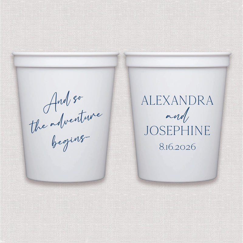 White stadium cups with blue script wedding text and couple names with date