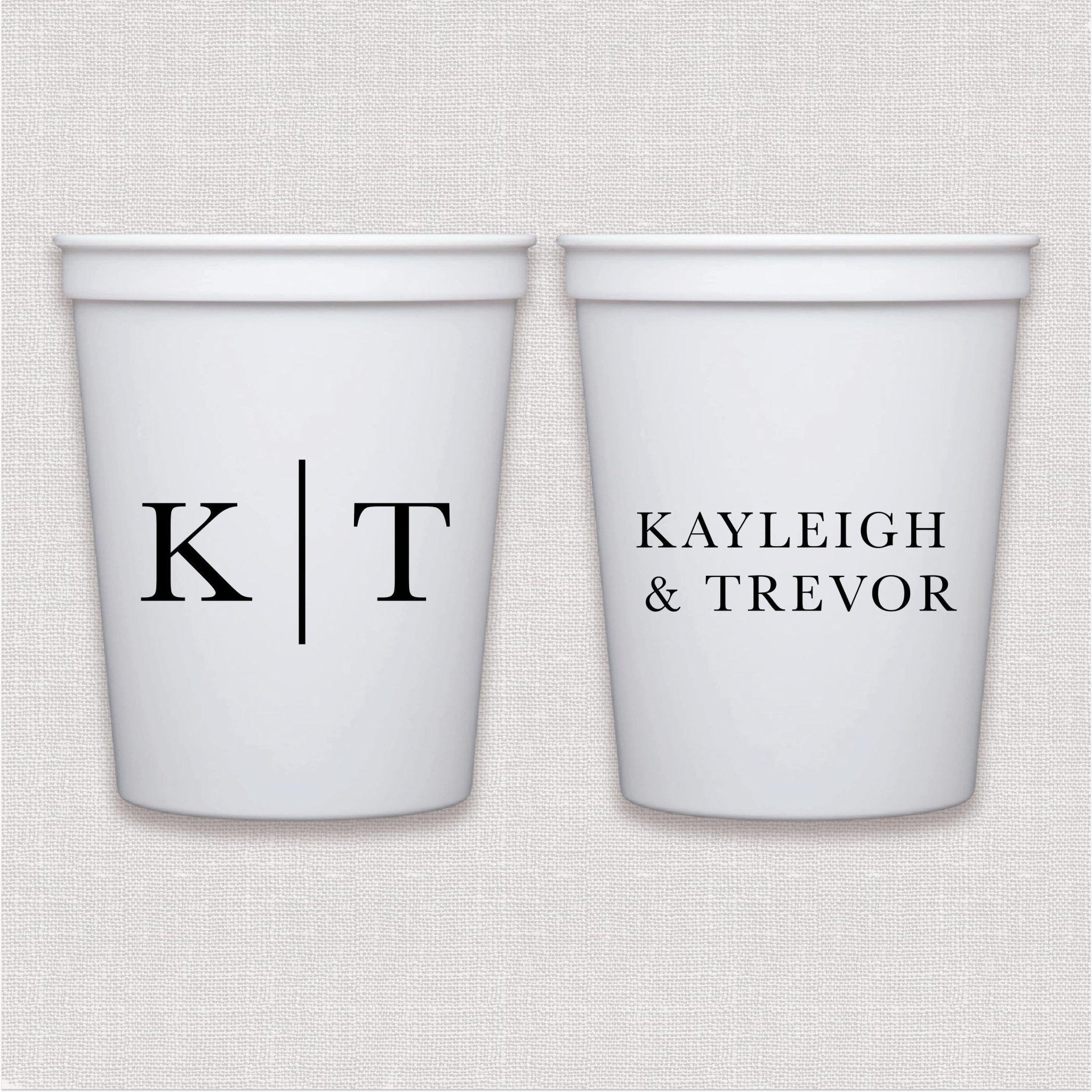 White stadium cup with personalized initials and couple names in modern serif font design