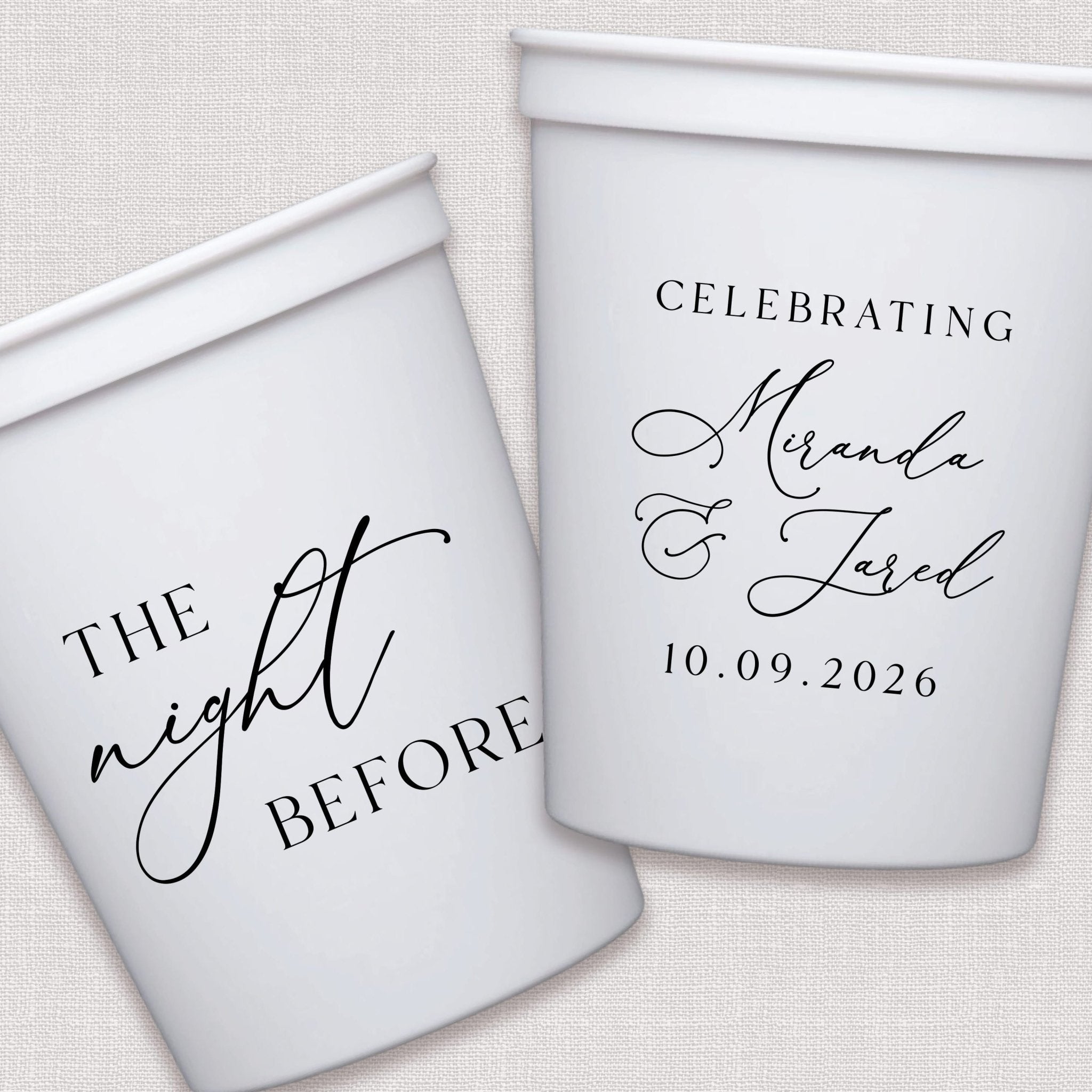 White stadium cups with black script wedding text designs