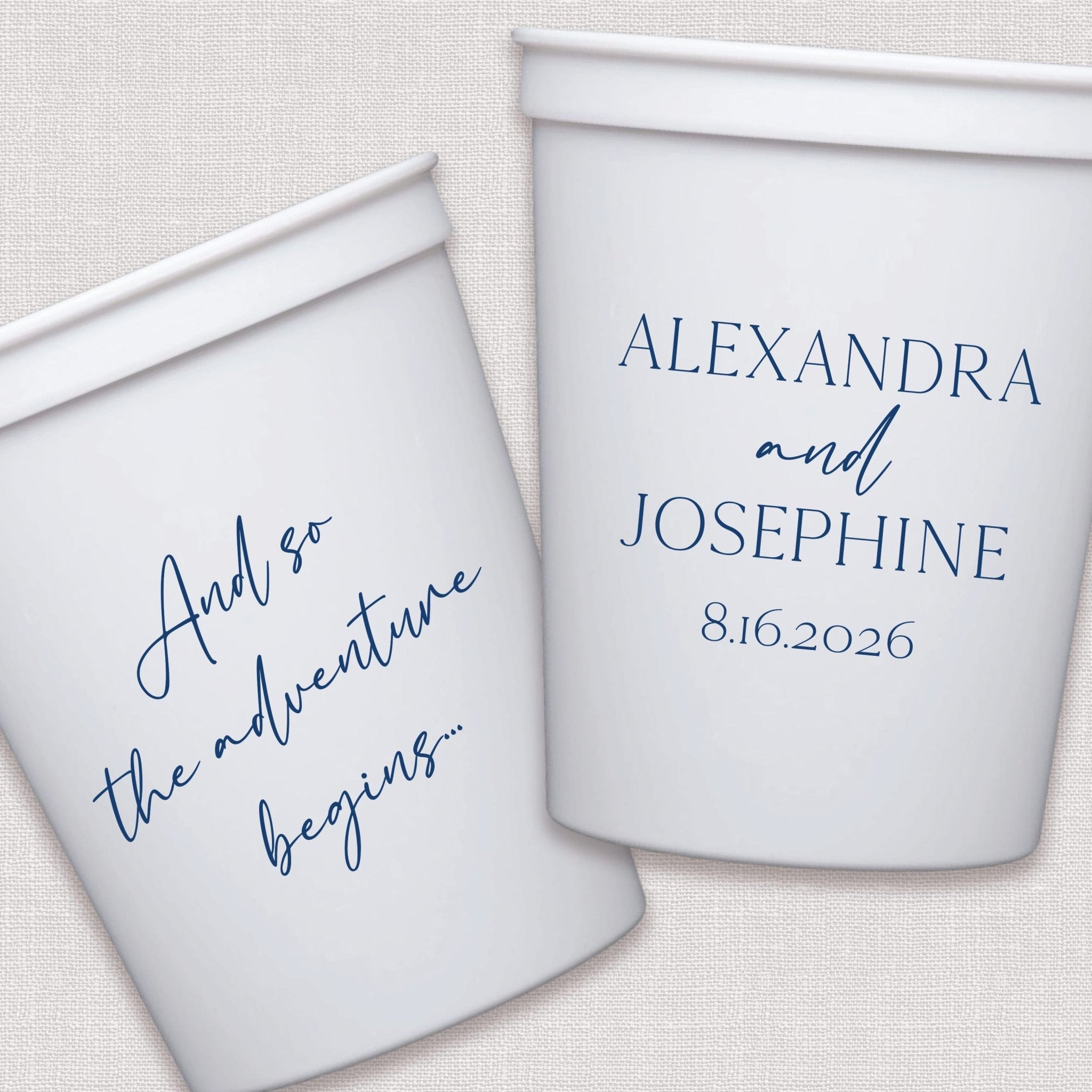 White stadium cups with personalized wedding text and date in blue script design