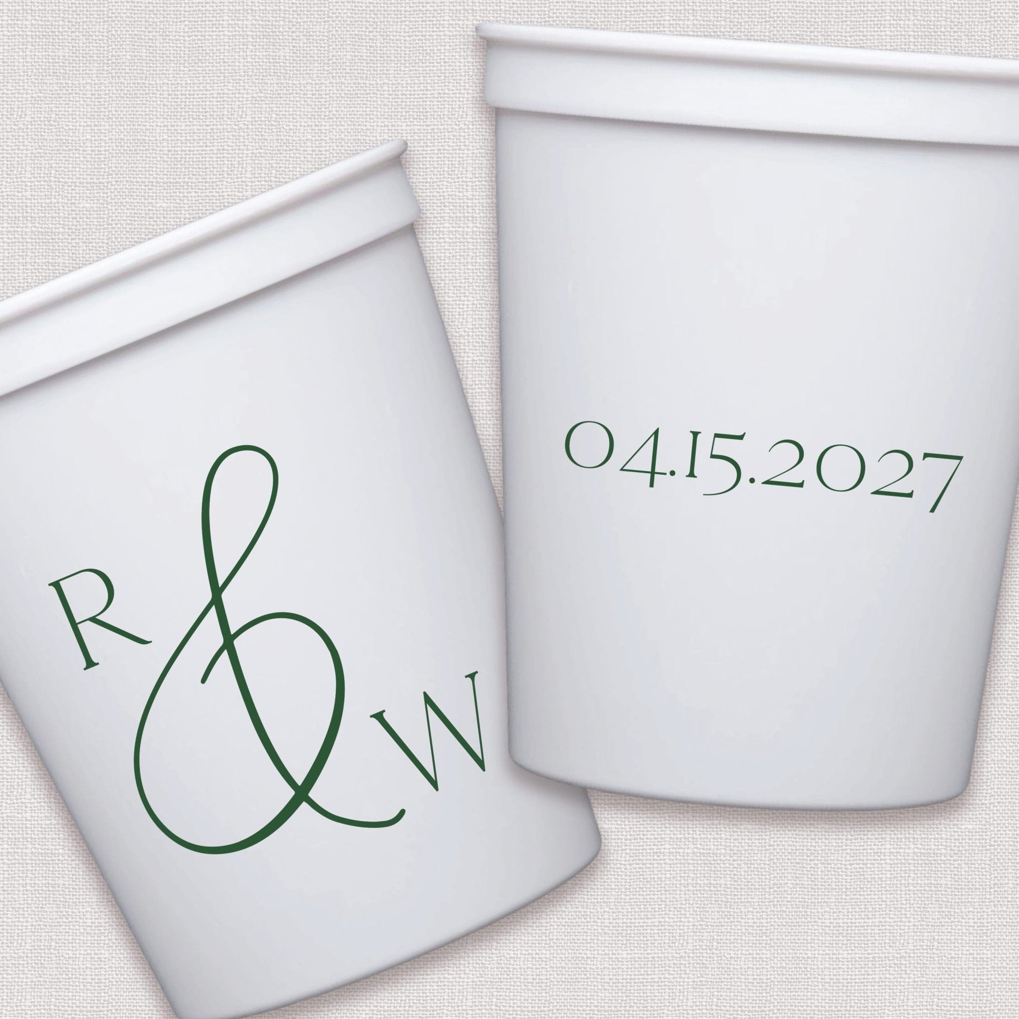 White stadium cups with sage green monogram and wedding date design