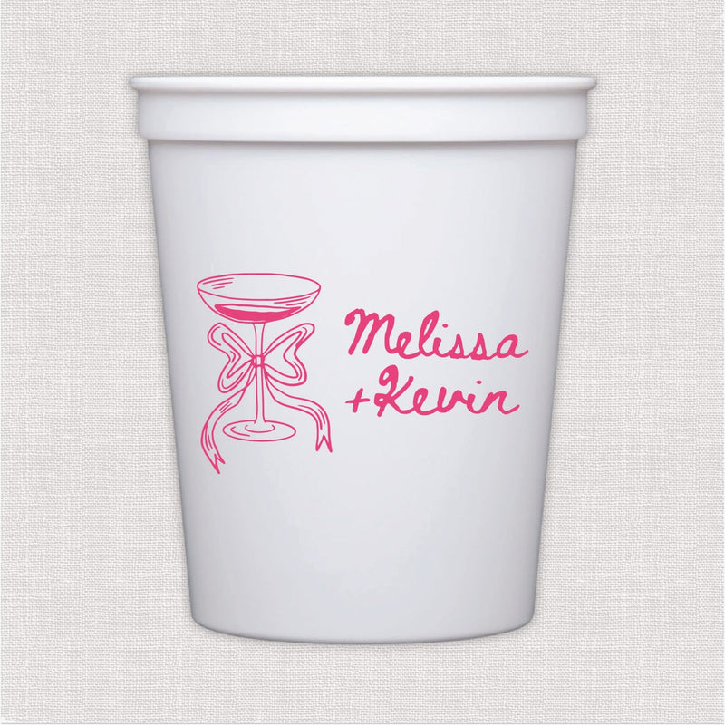 White stadium cup with pink champagne glass and script wedding text design