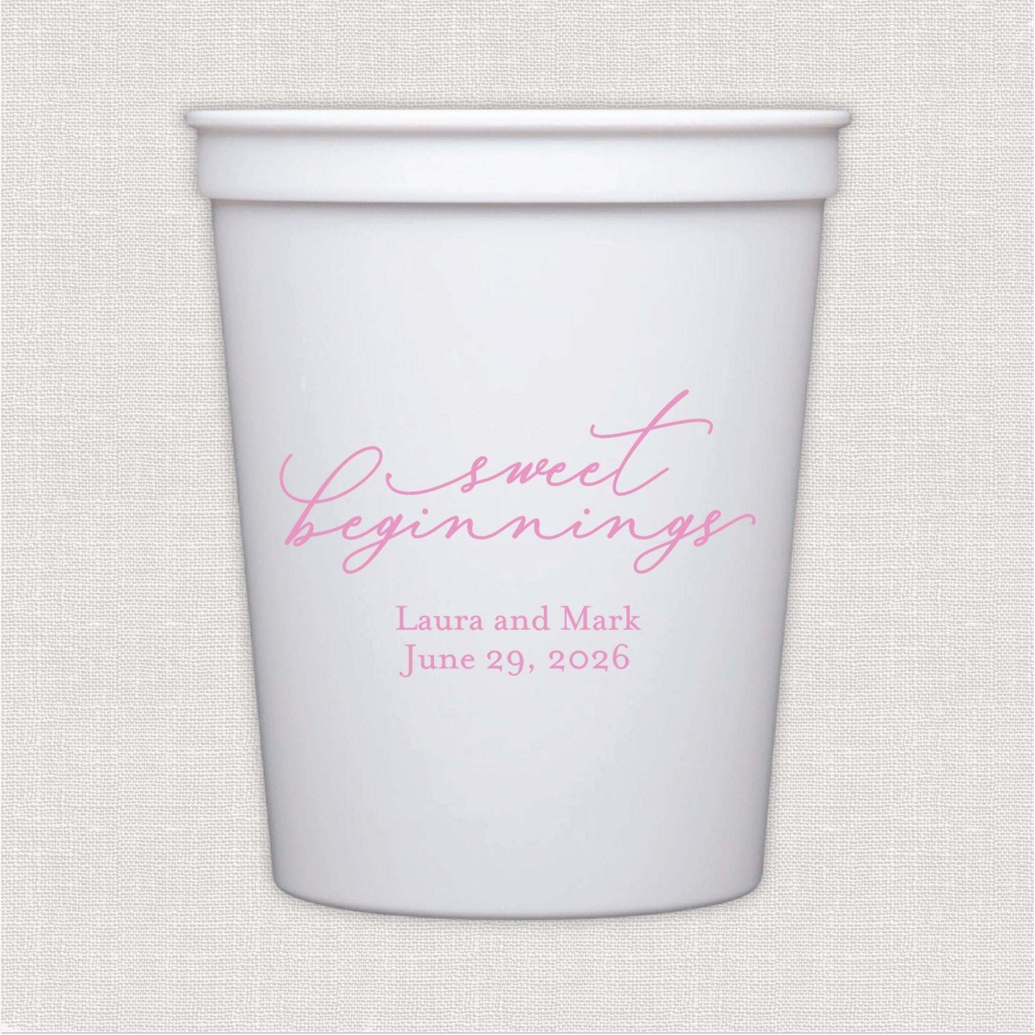 White stadium cup with pink script sweet beginnings wedding text design