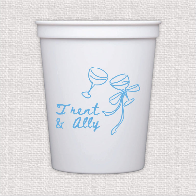White stadium cup with blue champagne glasses and personalized wedding text design