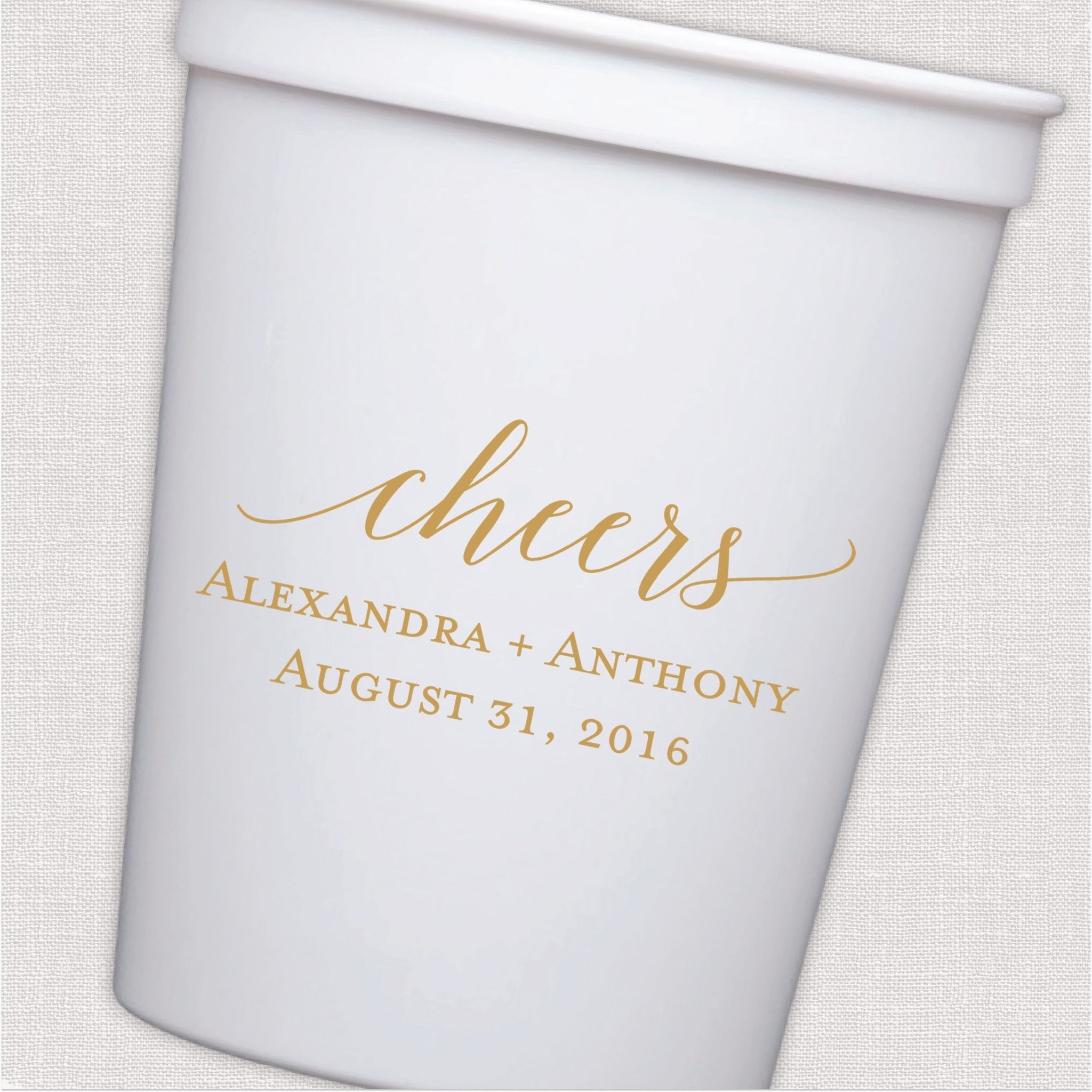 White stadium cup with gold foil cheers script and personalized wedding text