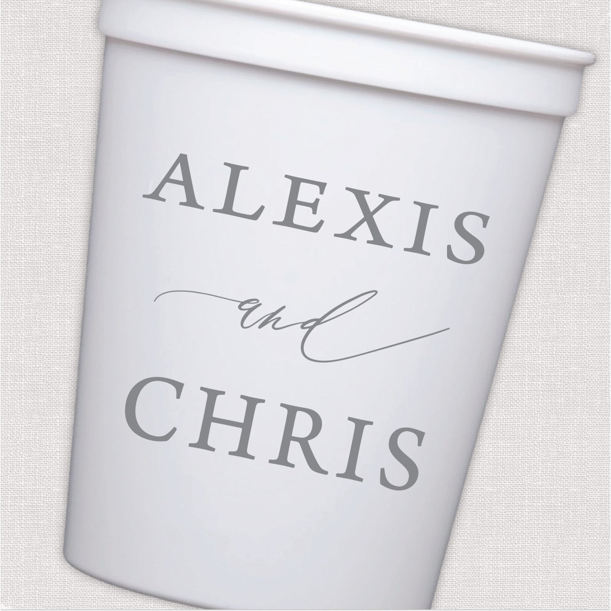 White stadium cup with personalized couple names and script text in gray print