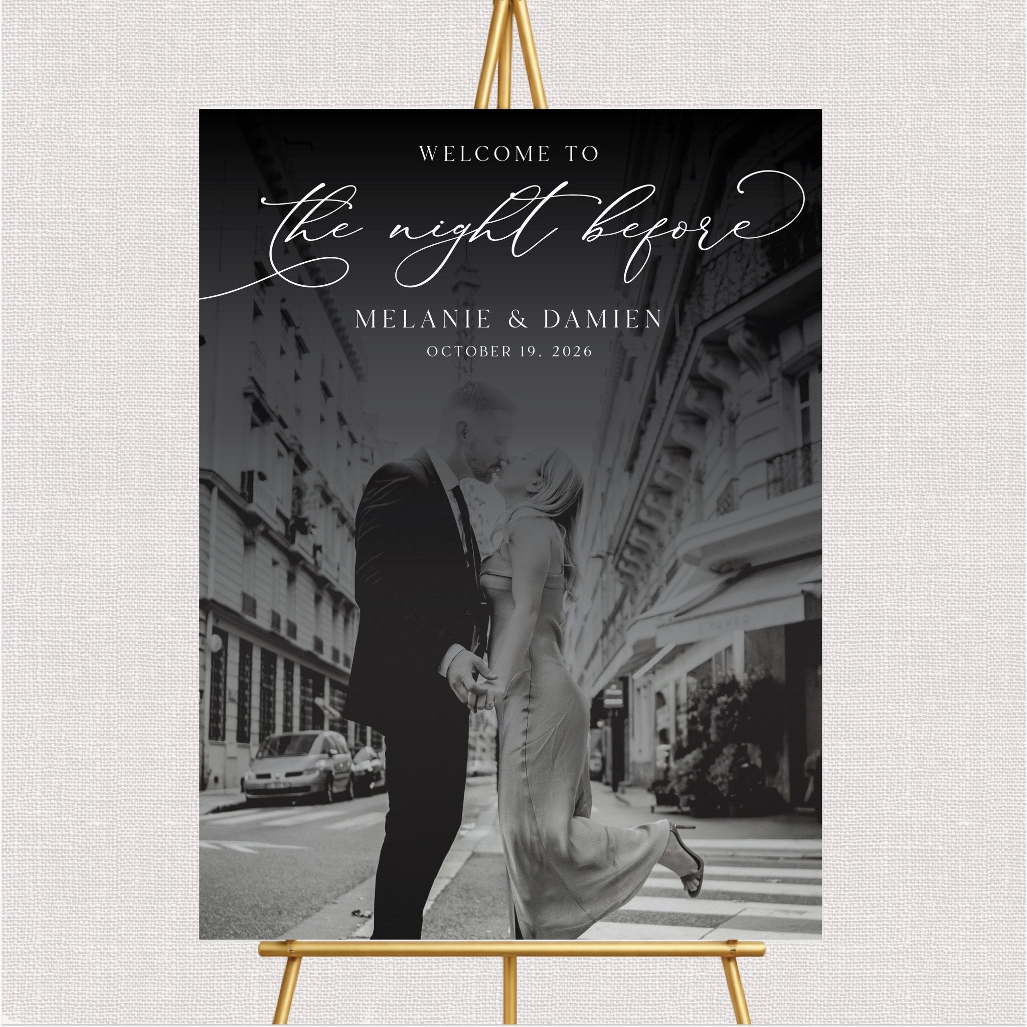 Black and white wedding photo welcome sign with gold script text and personalized couple names
