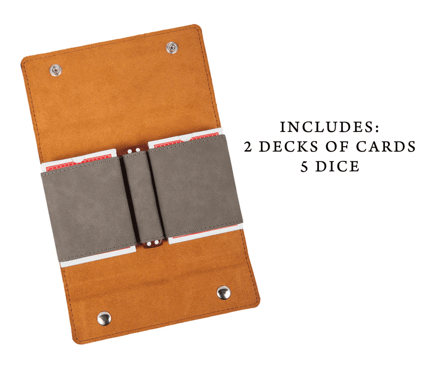 Tan leather card and dice organizer with gray interior pockets holding two decks of cards and five dice