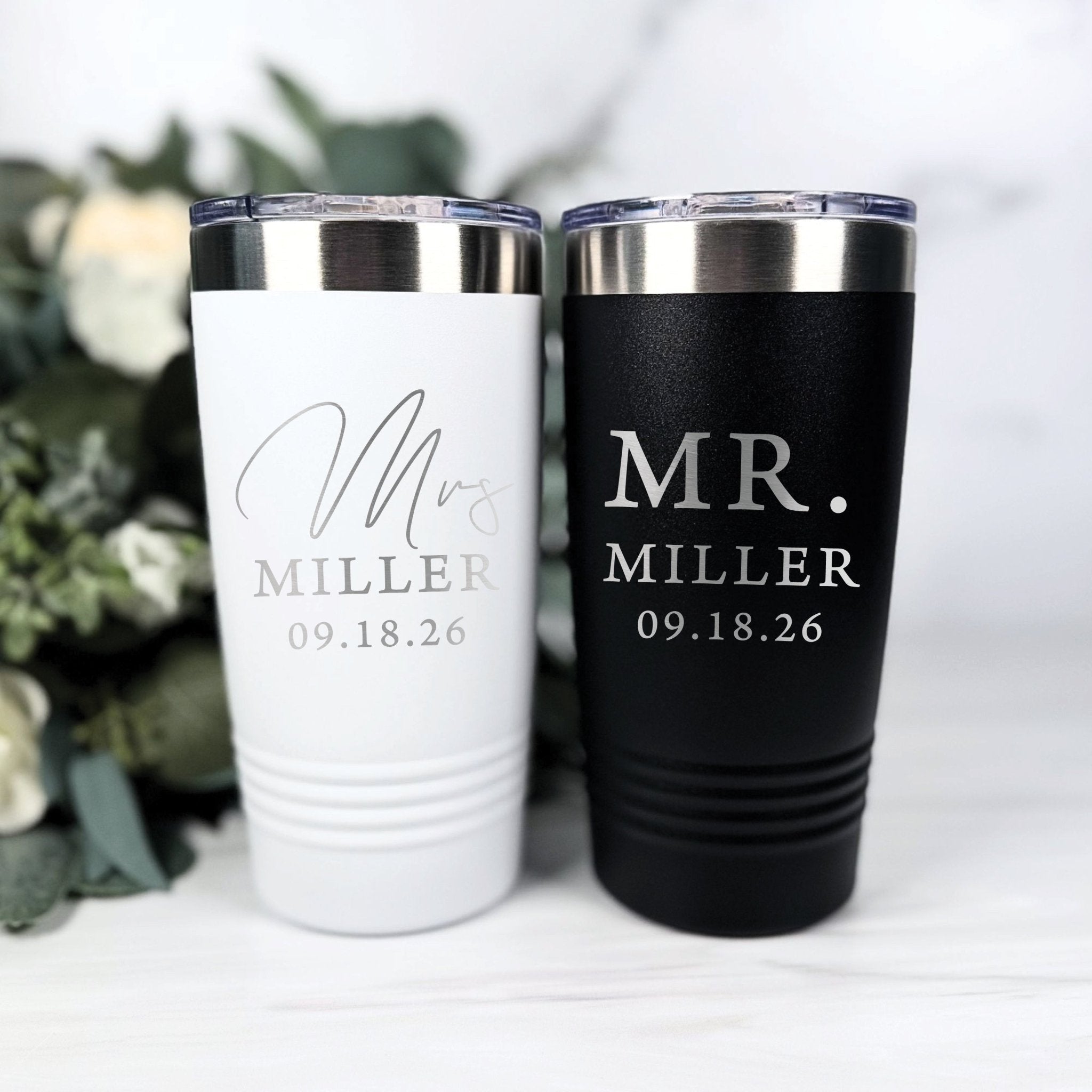 White and black insulated travel tumblers with personalized custom couple text text and wedding date design
