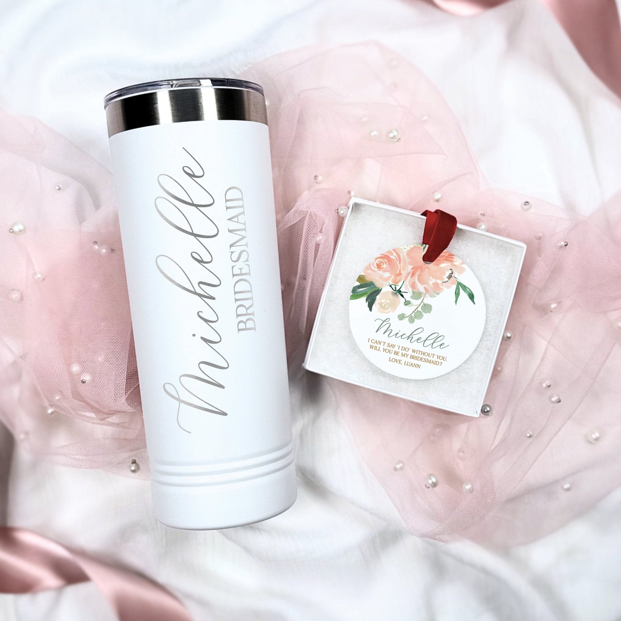 White tumbler with script personalized text and matching ornament with floral rose design, bridal party gift set