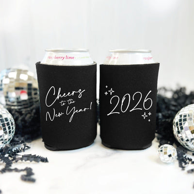 Two black neoprene can coolers featuring a festive white graphic design, perfect for keeping beverages cold at a celebration or party.