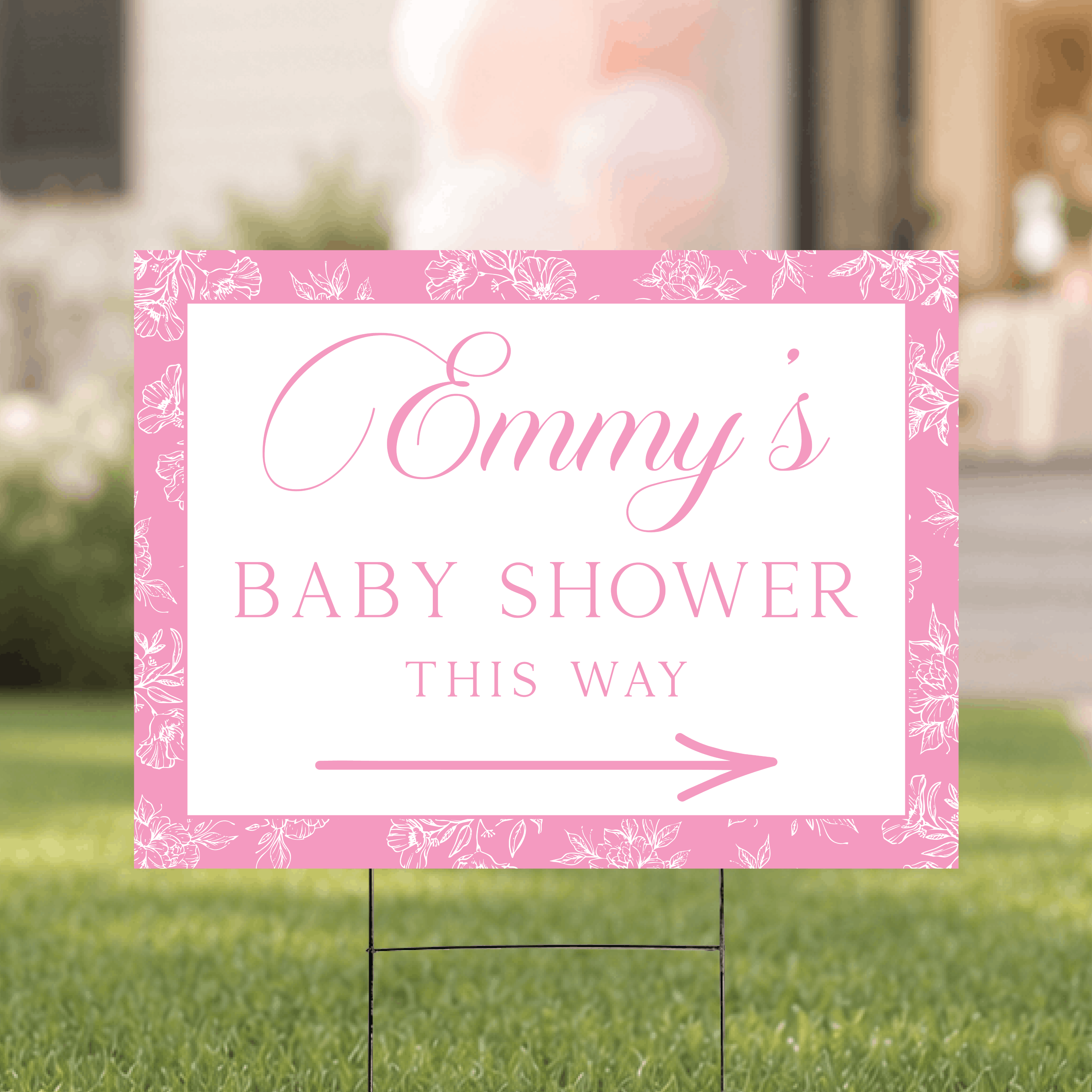Personalized floral toile baby shower directional yard sign displayed outdoors on a staked H-frame, featuring the classic toile pattern with custom name and arrow.