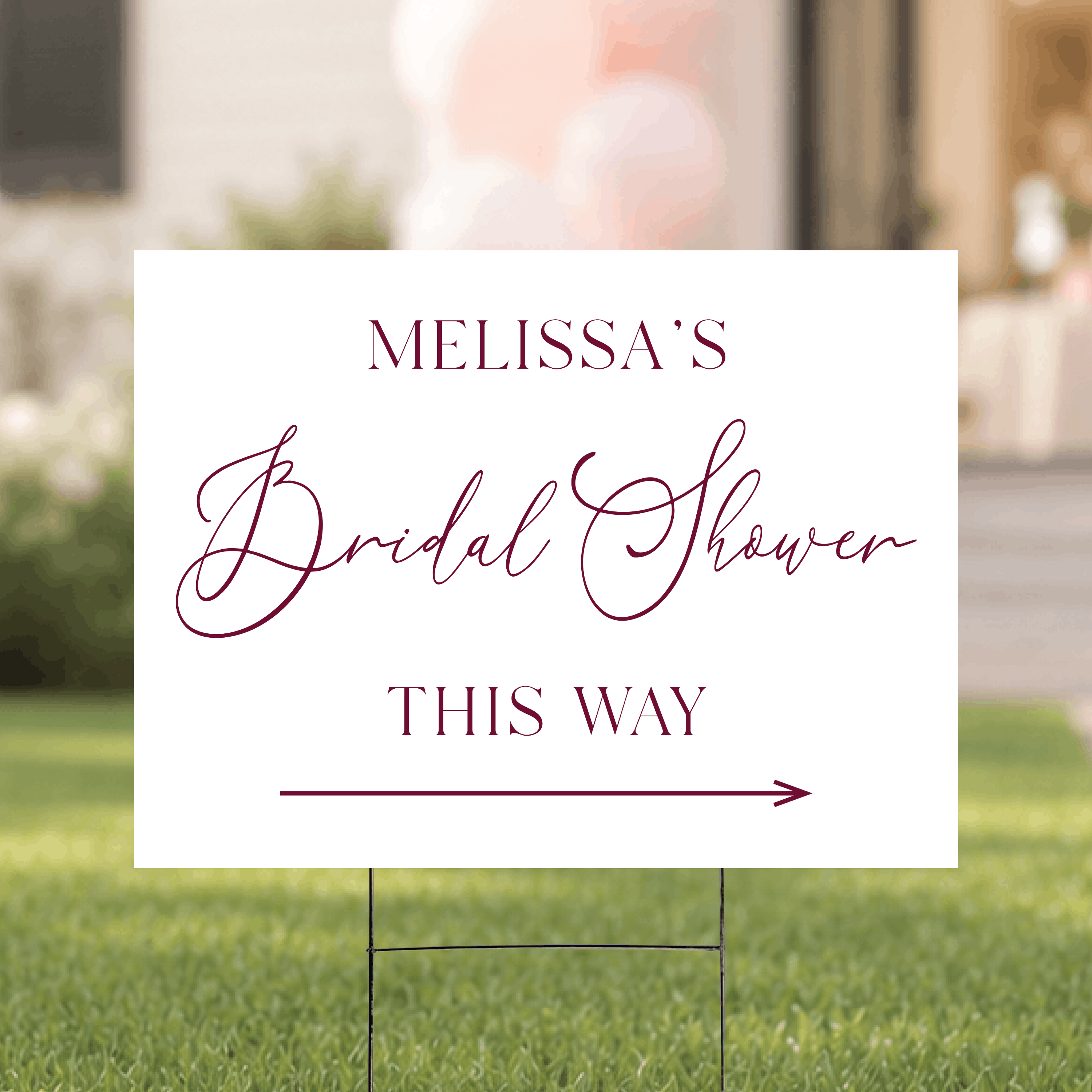 Modern script bridal shower directional yard sign displayed outdoors on a staked H-frame, featuring a clean white background with elegant typography and custom name and arrow.