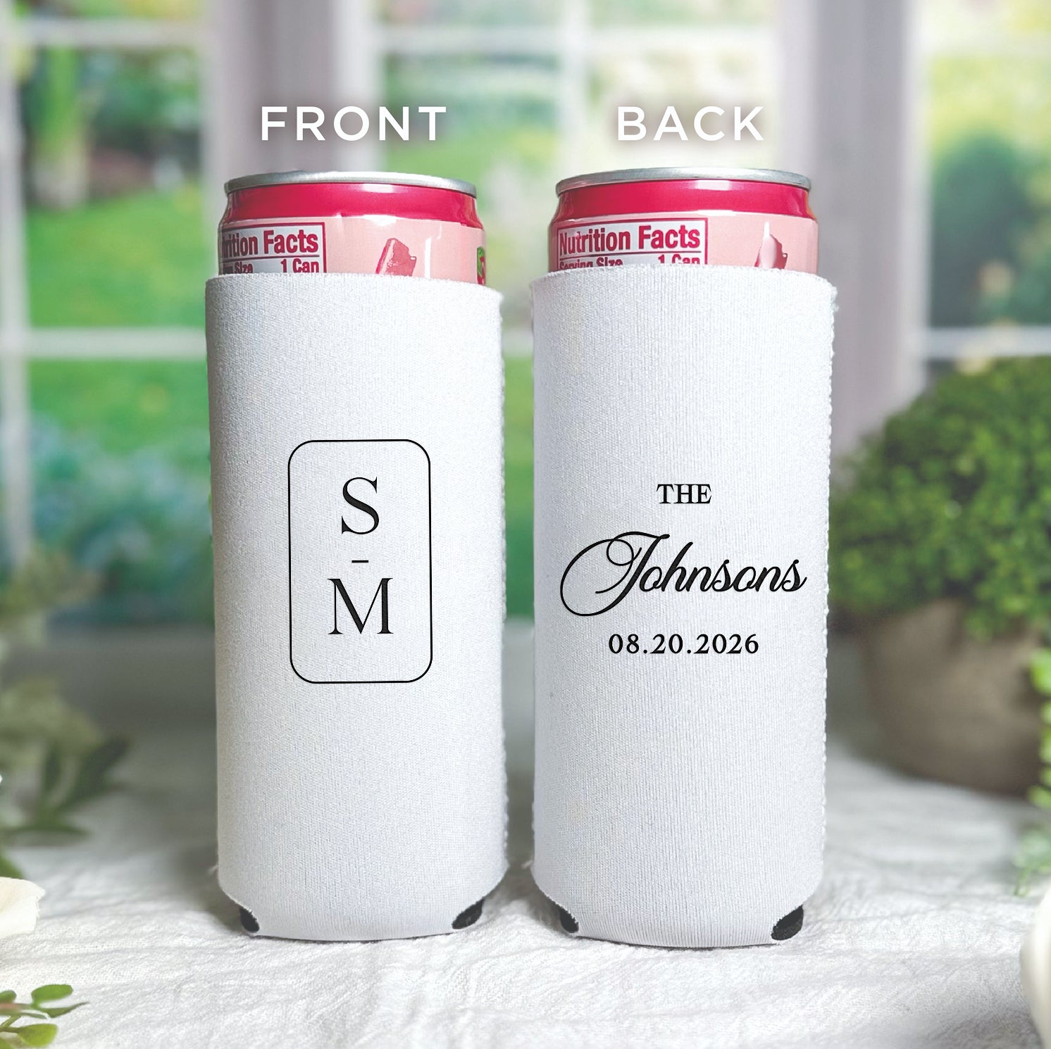 Personalized slim can coolers with modern monogram design showing couple's initials and wedding details