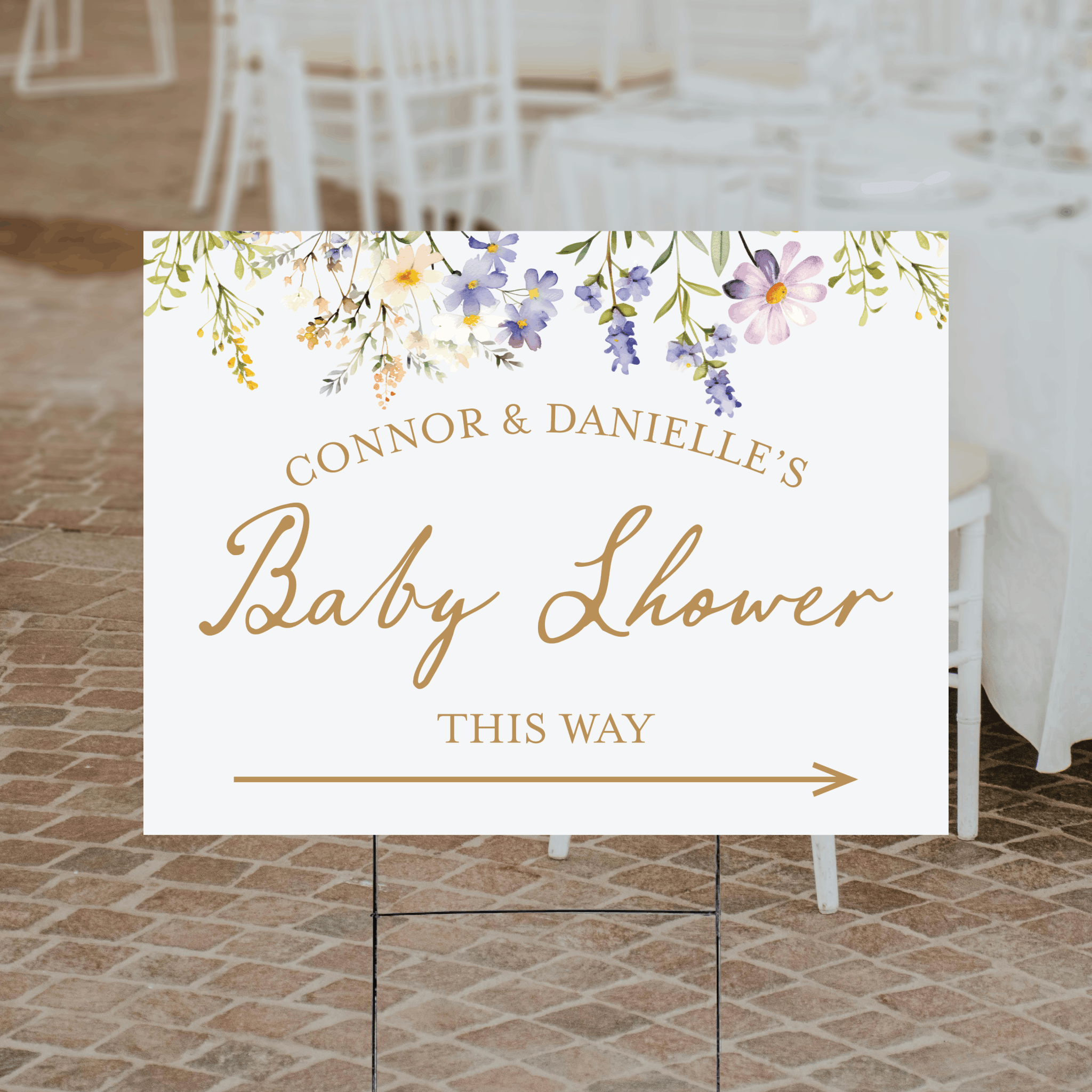 A personalized floral baby shower directional yard sign with a fixed botanical floral design, custom text, and a choice of ink color and arrow direction, printed on corrugated plastic.